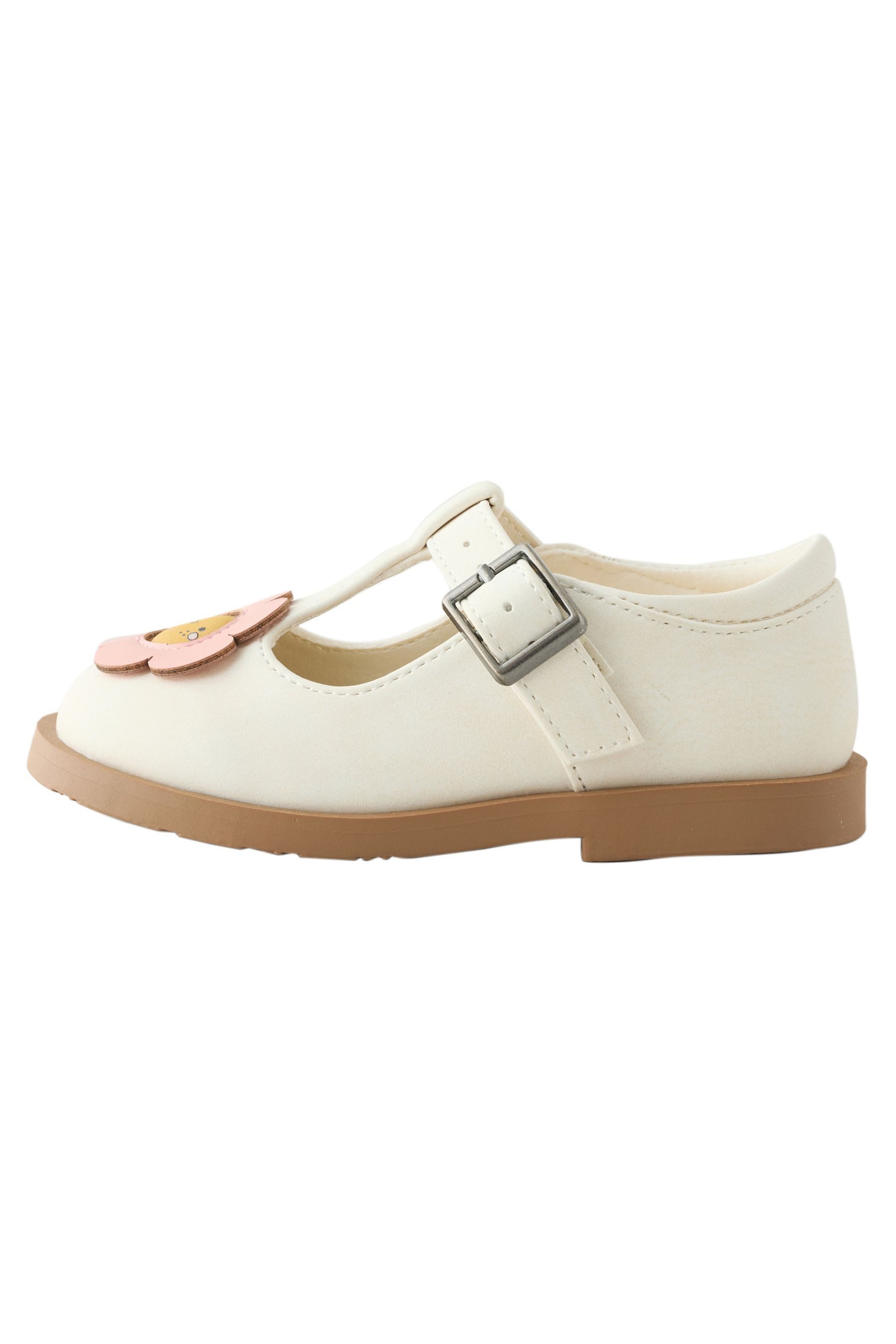 Schuhe mit T-Steg T-Strap-Sandale