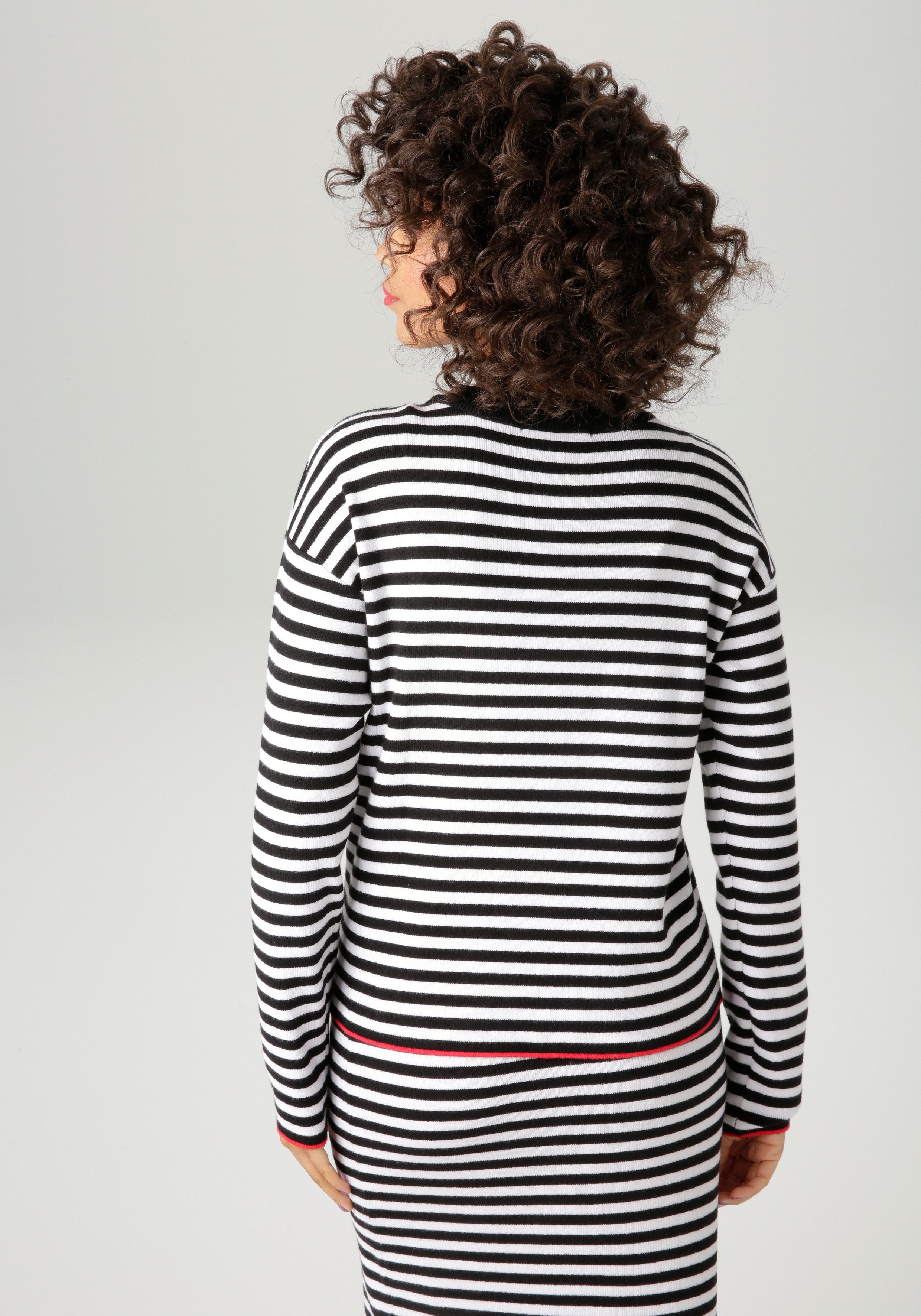 Aniston CASUAL Strickpullover mit roten Farbakzenten am Saum und den Ärmeln günstig online kaufen