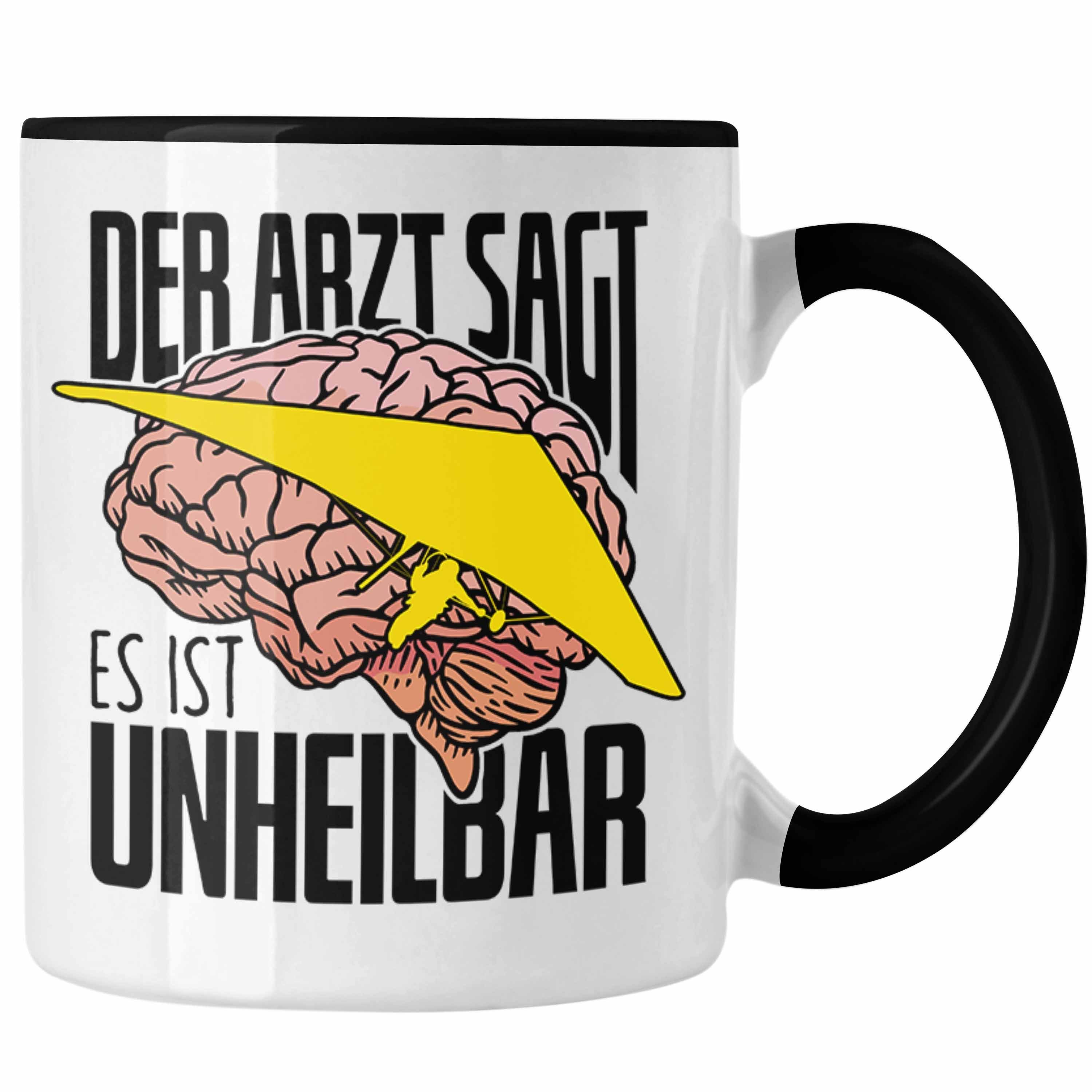 Trendation Tasse Geschenk für Sagt Tasse "Der Drachenflieger Hängegleiter Arzt Spruch Schwarz