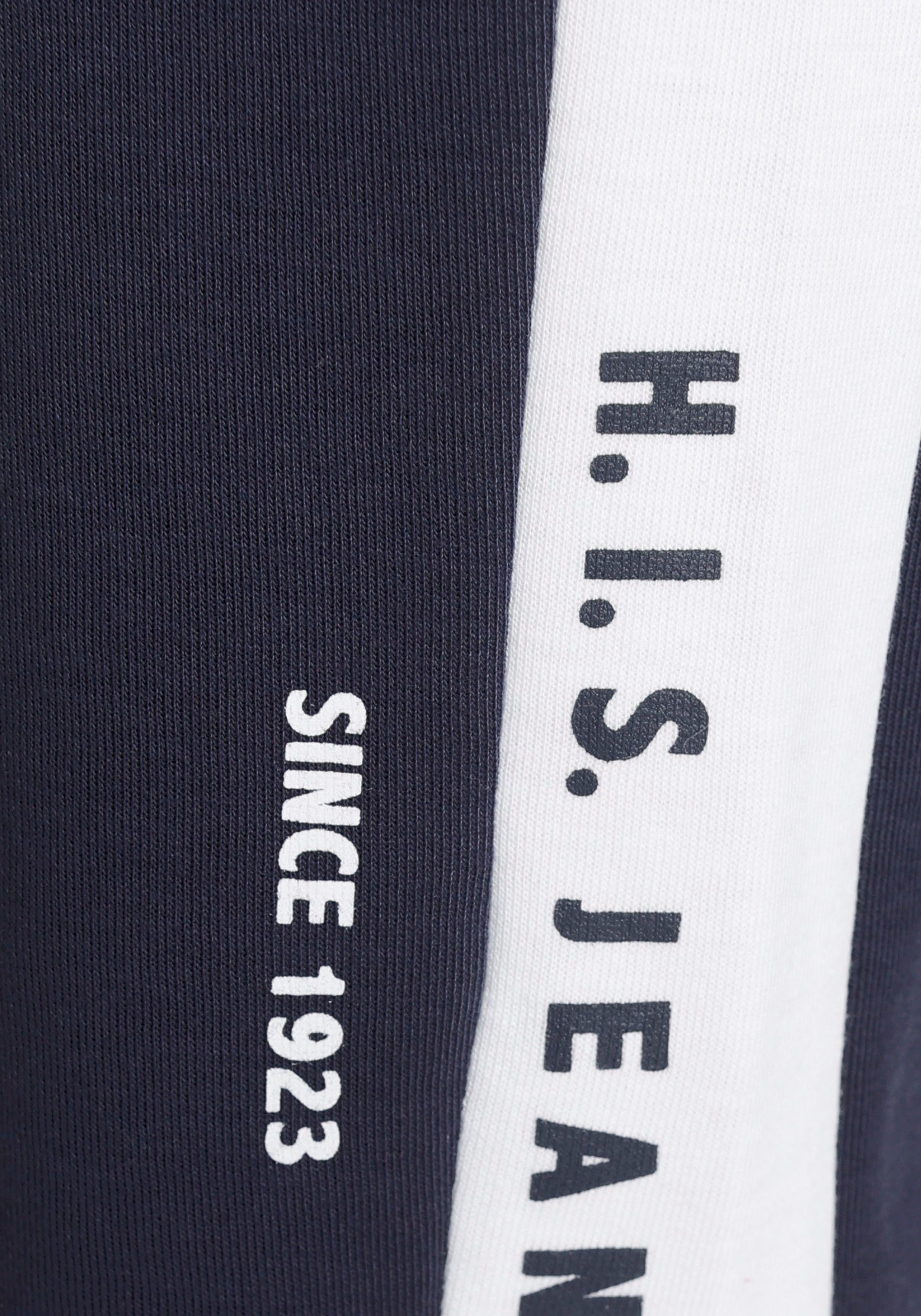 H.I.S Seitenstreifen marine mit weißem Loungeanzug und Relaxhose Logodruck,