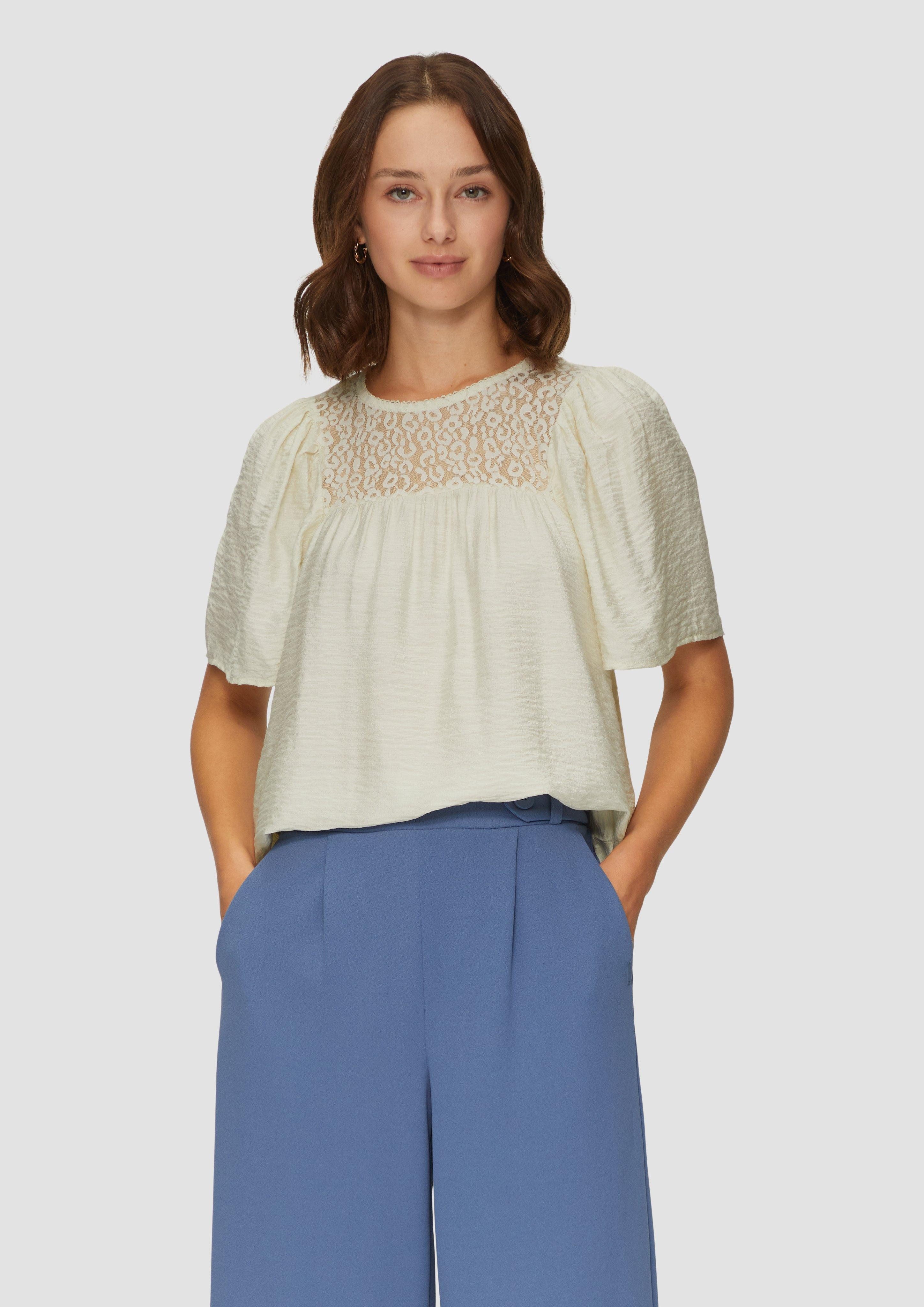 Kurzarmbluse Bluse mit Leo-Spitze