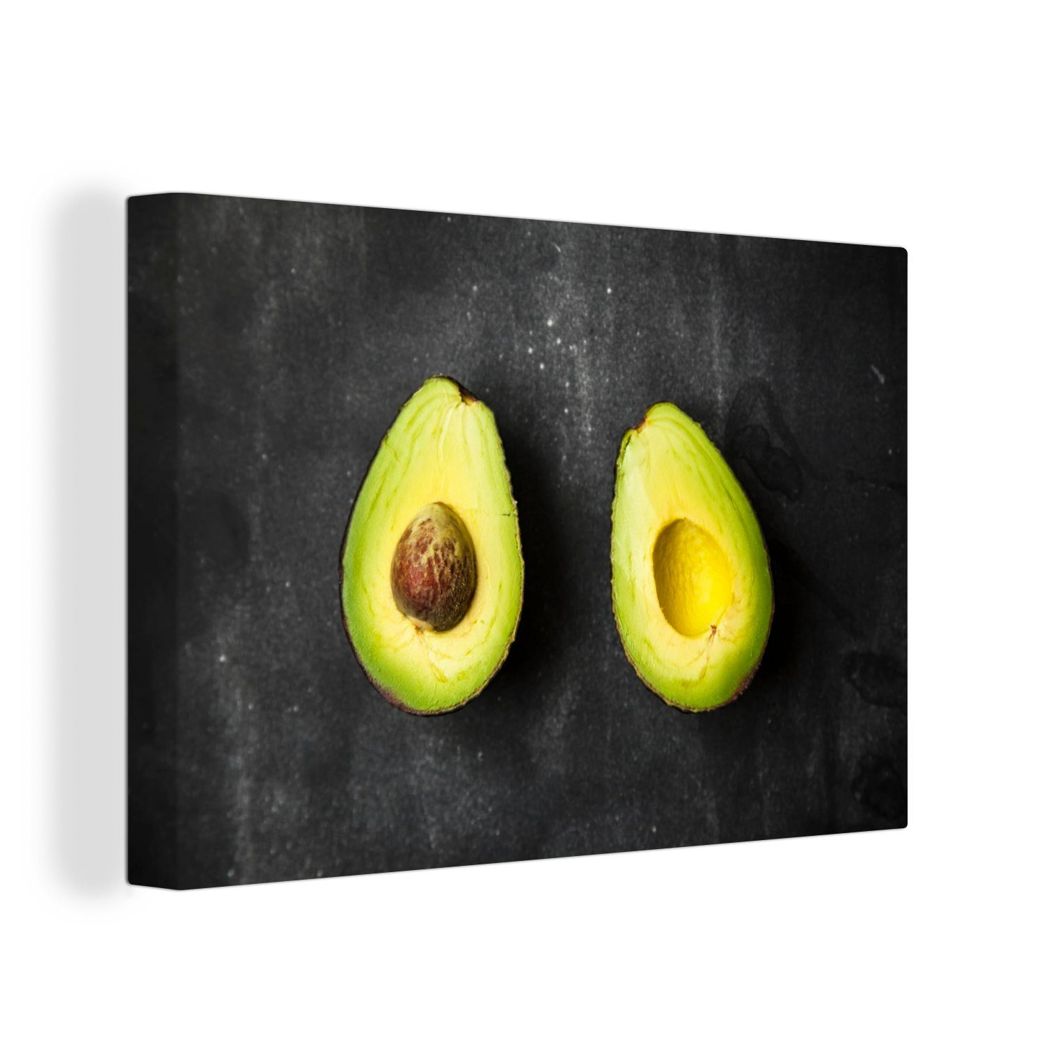 OneMillionCanvasses® Leinwandbild Avocadohälften auf einem Tisch, (1 St), Wandbild Leinwandbilder, Aufhängefertig, Wanddeko, 30x20 cm
