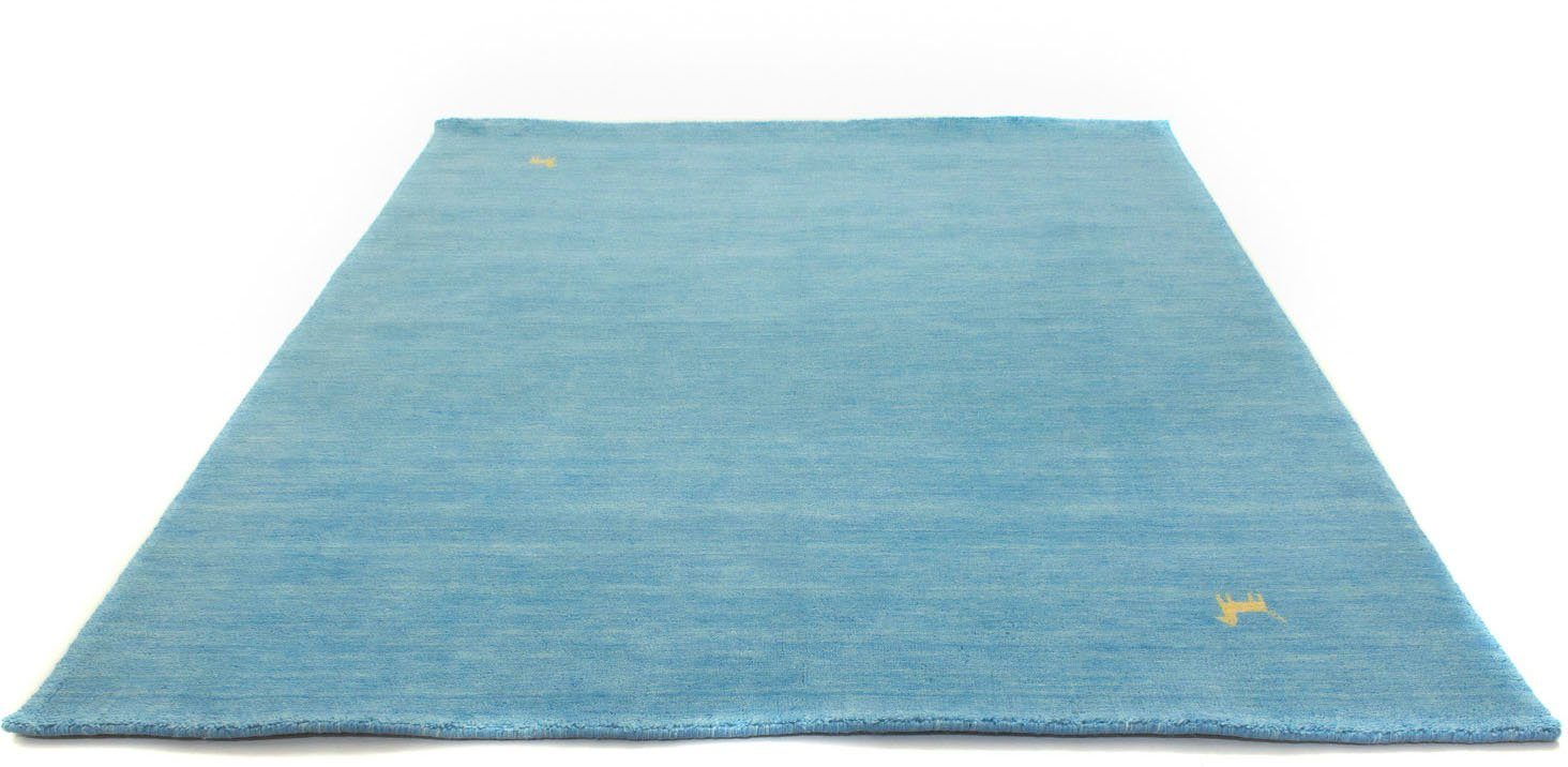 Wollteppich GABBEH ASTERIA, morgenland, rechteckig, Höhe: 18 mm, reine Schurwolle, Uni Tiermotiv, Wohnzimmer blau