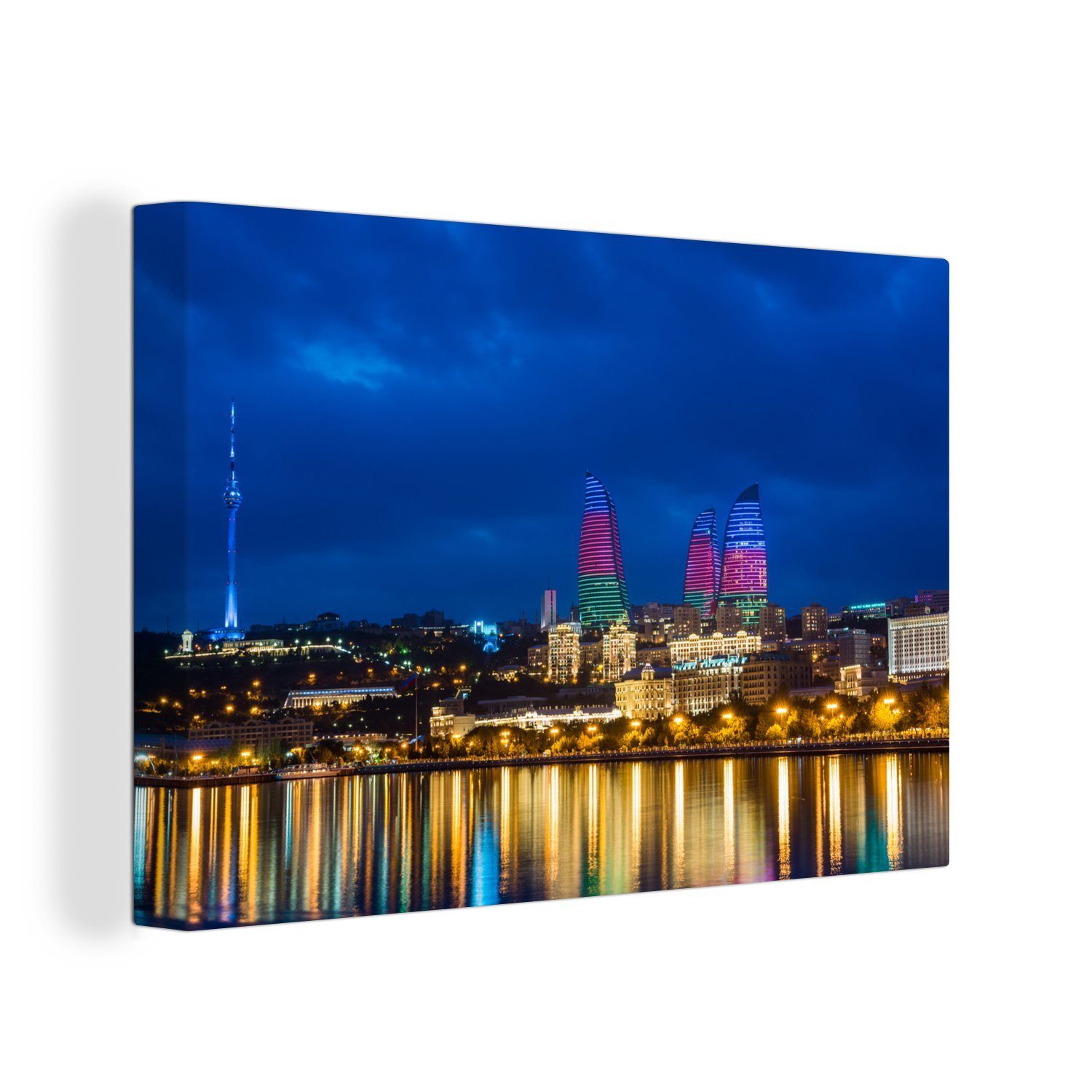 OneMillionCanvasses® Leinwandbild Die bunten Lichter von Baku spiegeln sich im ruhigen Wasser, (1 St), Wandbild Leinwandbilder, Aufhängefertig, Wanddeko, 30x20 cm