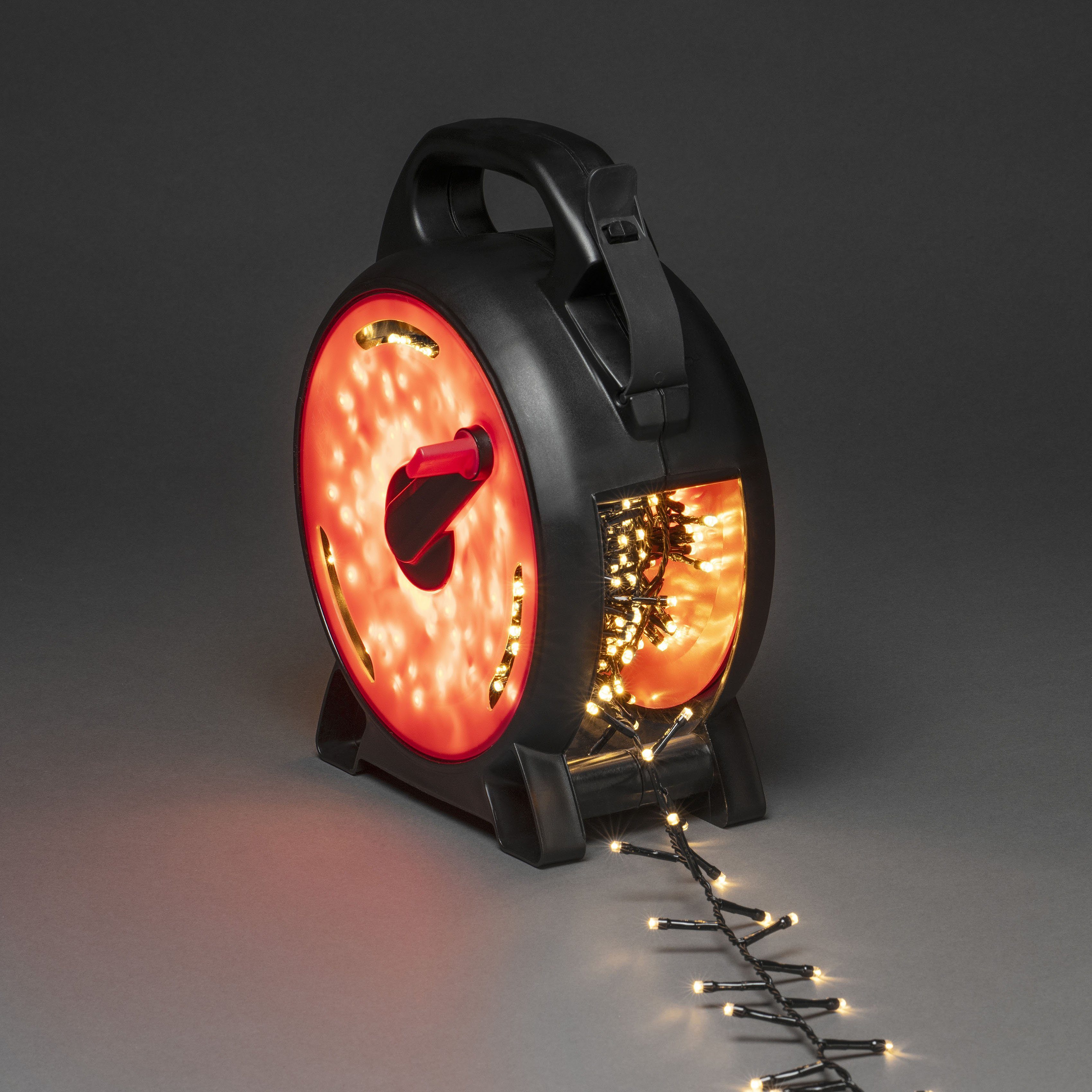 KONSTSMIDE LED-Lichterkette, 600-flammig, Micro LED Compactlights Lichterkette mit Kabelaufroller, schwarz-rot