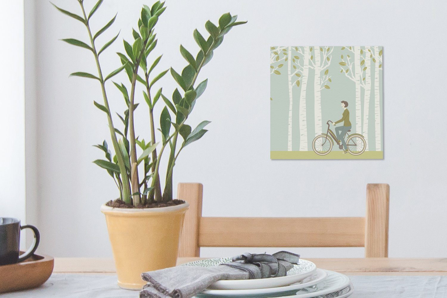 Schlafzimmer einer vor Leinwand Frau, Bilder Leinwandbild St), OneMillionCanvasses® für einem Fahrrad mit (1 Birkenwäldchen, die dem Wohnzimmer Illustration