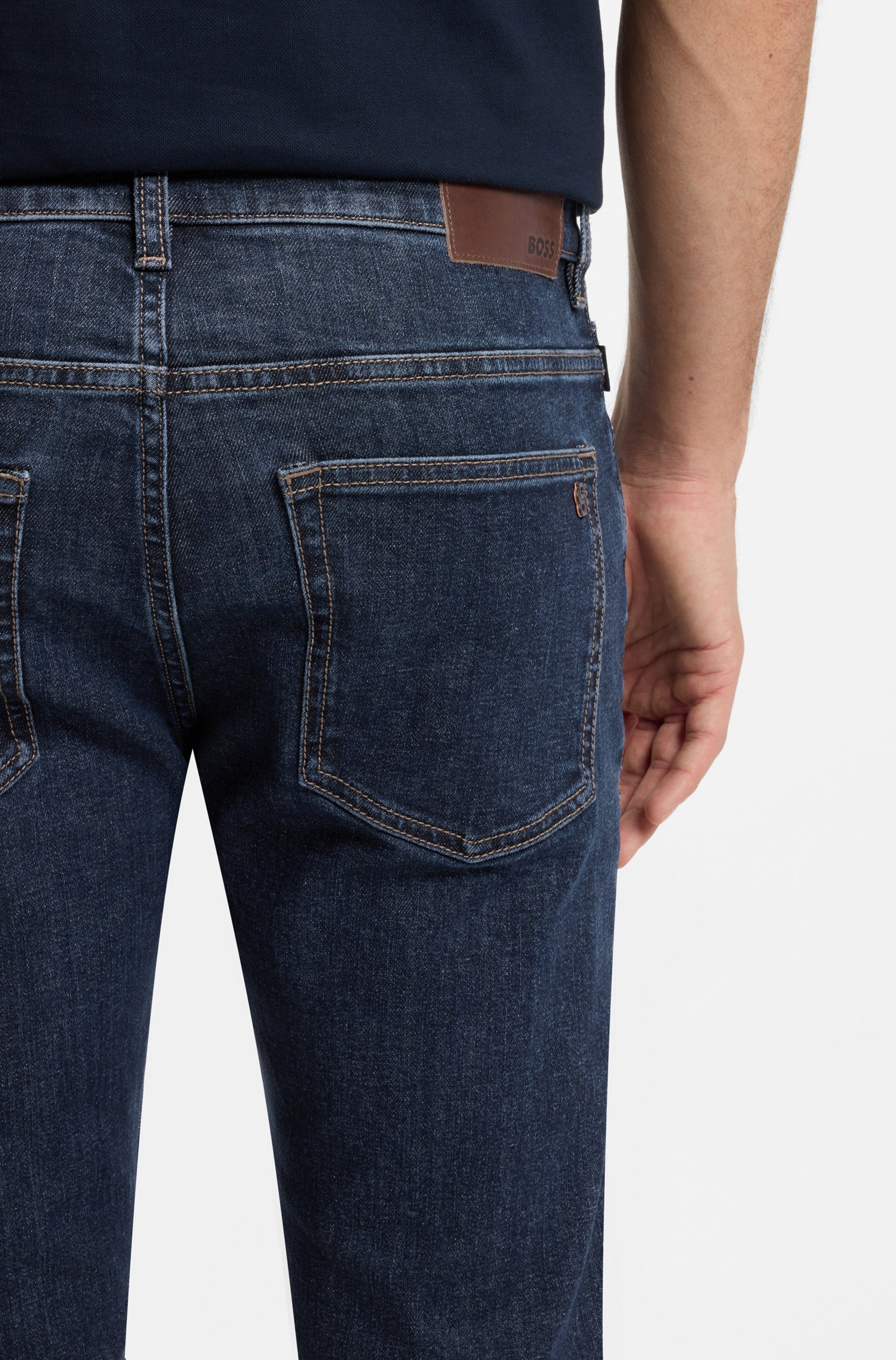 BOSS ORANGE 5-Pocket-Jeans Delaware Soft-Motion-Denim Schmale Passform Mittlere Leibhöhe