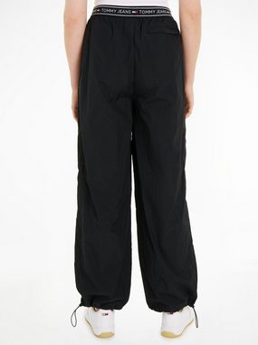 Tommy Jeans Webhose TJW BAGGY TAPING TRACKPANT EXT mit Logoprägung