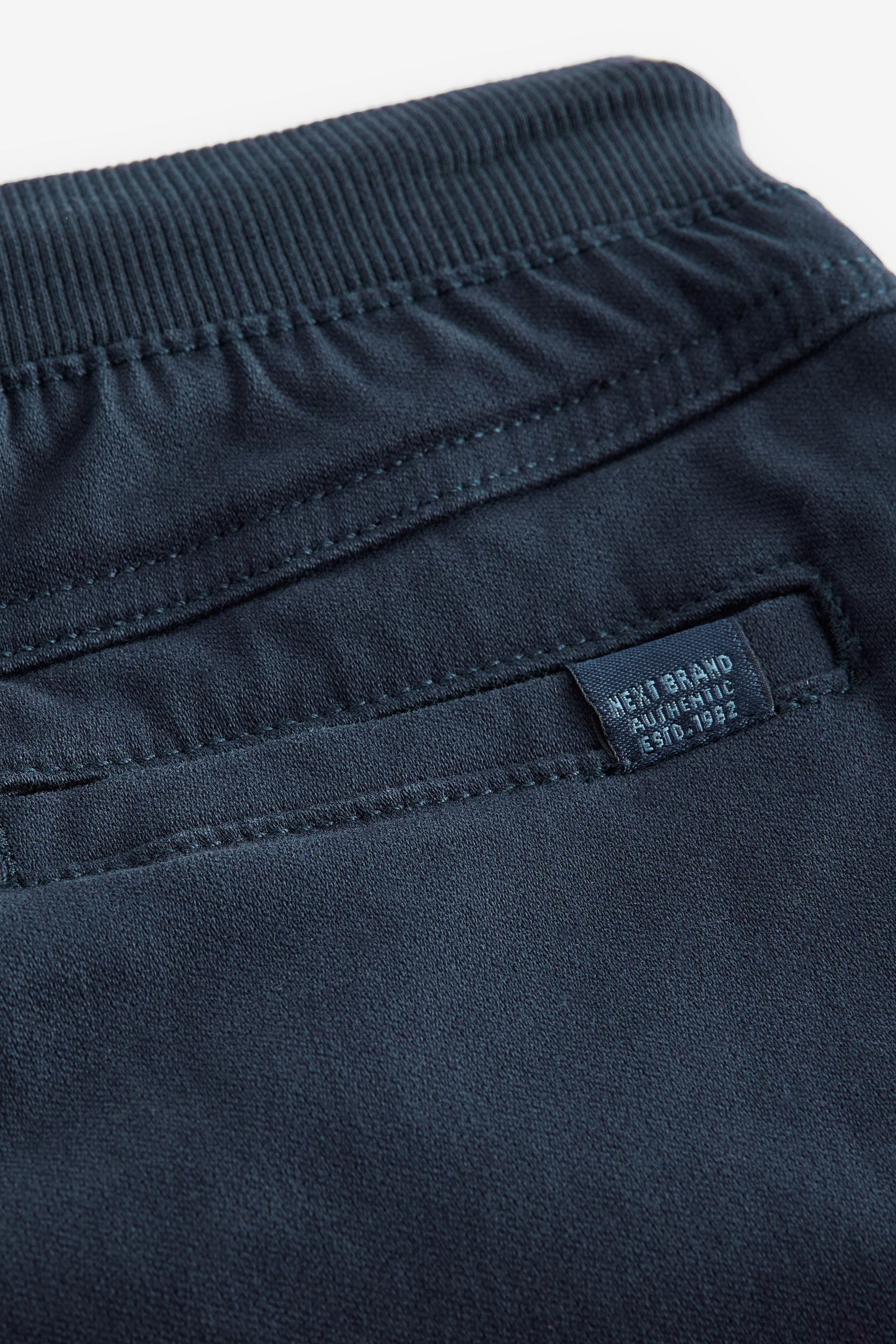 Next Schlupfhose Wide Fit Schlupfhose mit geripptem Bund (1-tlg)