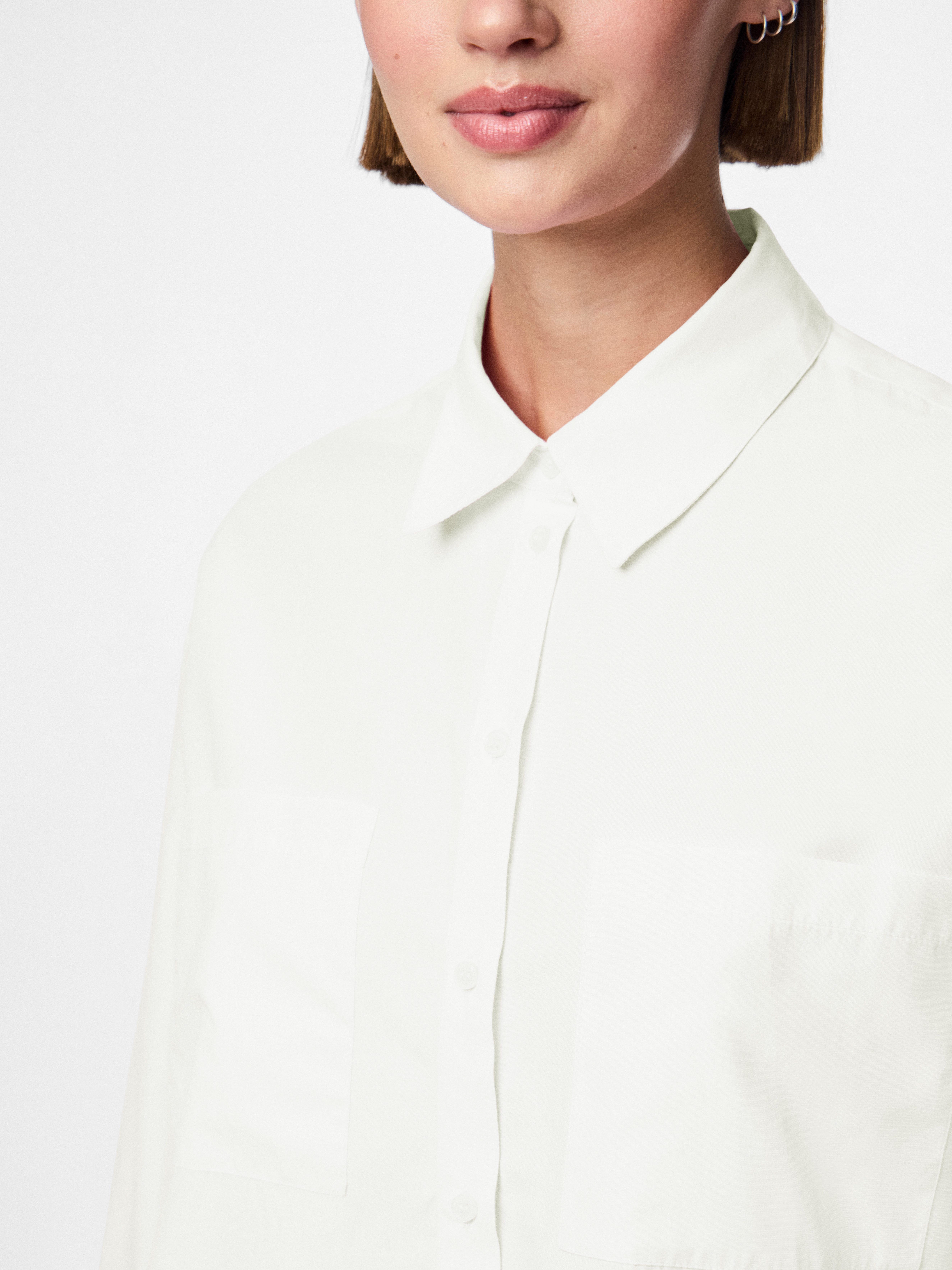 pieces Hemdbluse PCMELIA LS LOOSE SHIRT WVN NOOS BC mit abgerundetem Saum günstig online kaufen