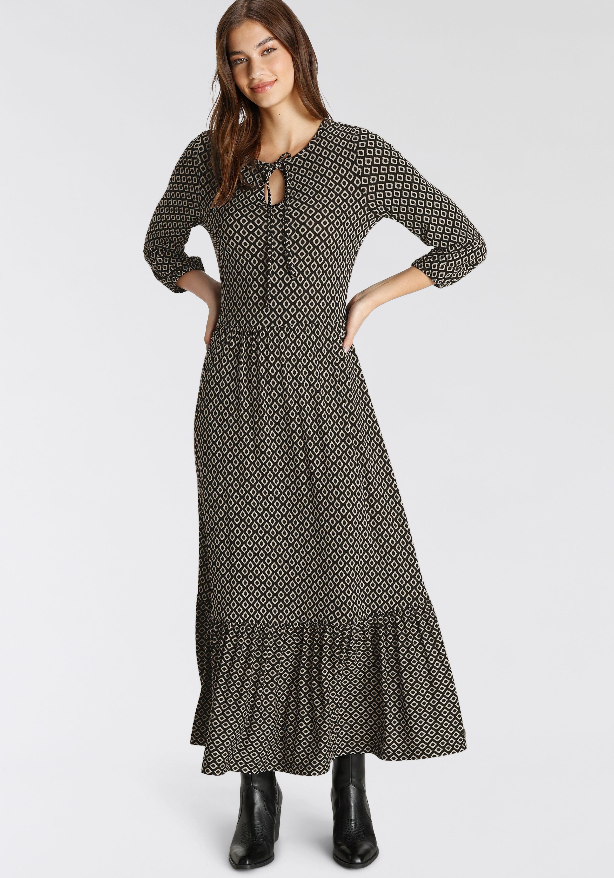 Tamaris Midikleid aus bequemem Jersey mit Schnürdetail. € 59,99