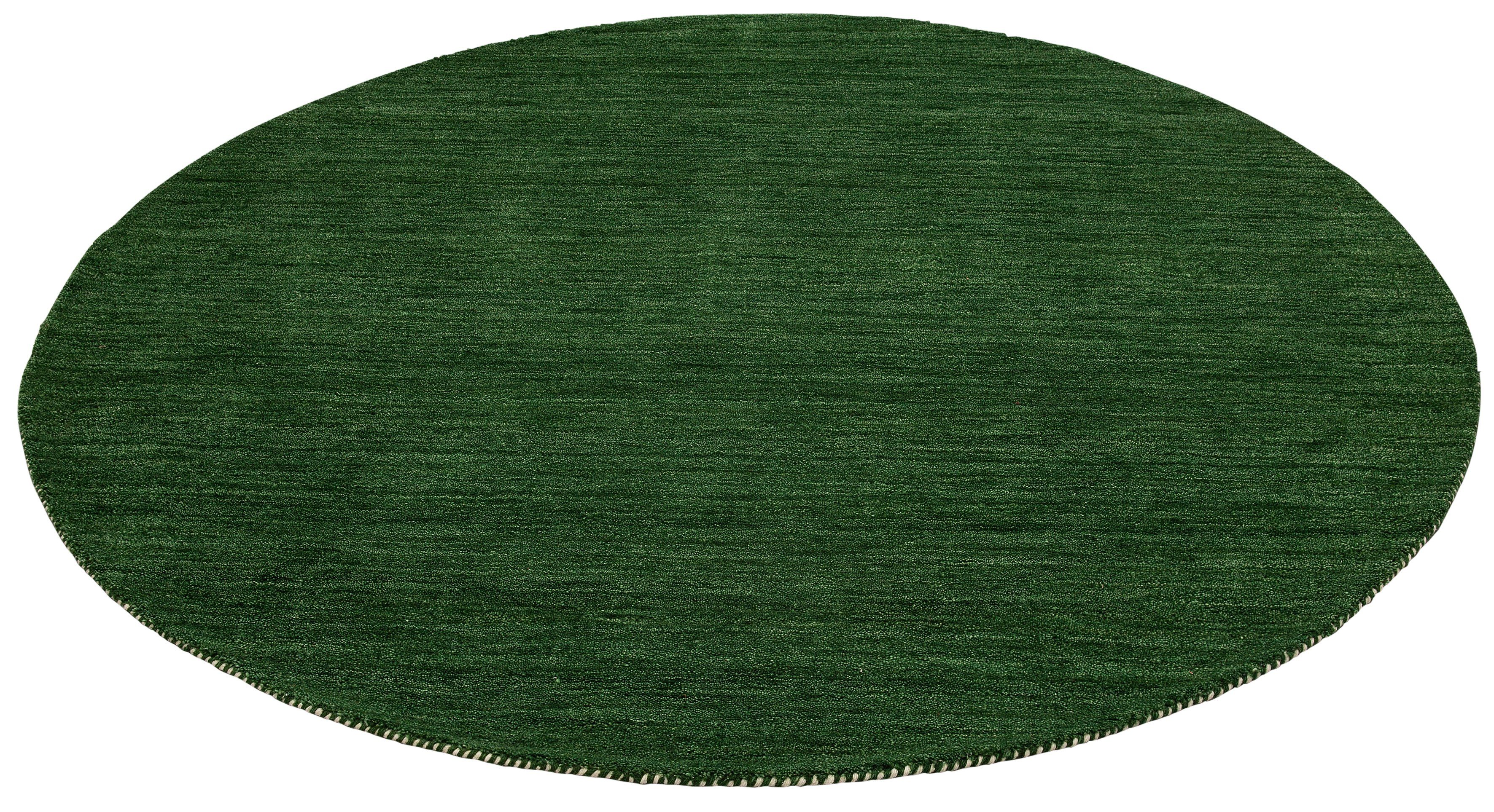 Wollteppich Gabbeh Uni, THEKO, rund, Höhe: 14 mm, Handweb Teppich, reine Wolle, handgewebt, elegant meliertes Garn dunkelgrün