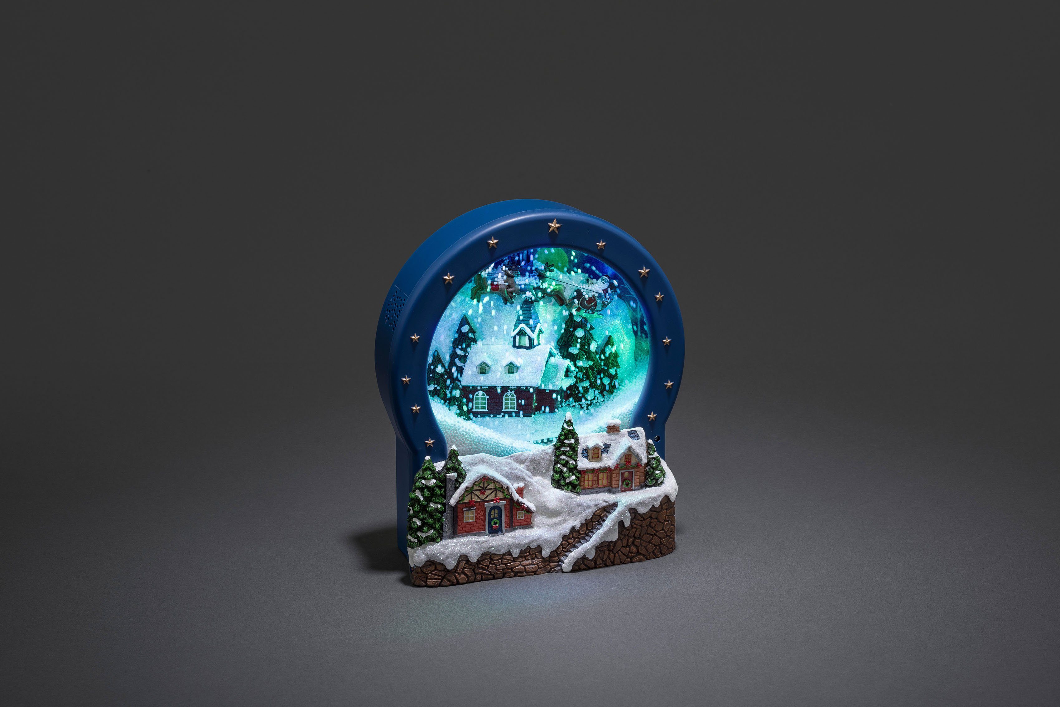 KONSTSMIDE LED Dekolicht Weihnachtsdeko, LED fest integriert, Warmweiß,  Szenerie Dorf, Glas, mit Animation + 8 klassischen Weihnachtsliedern
