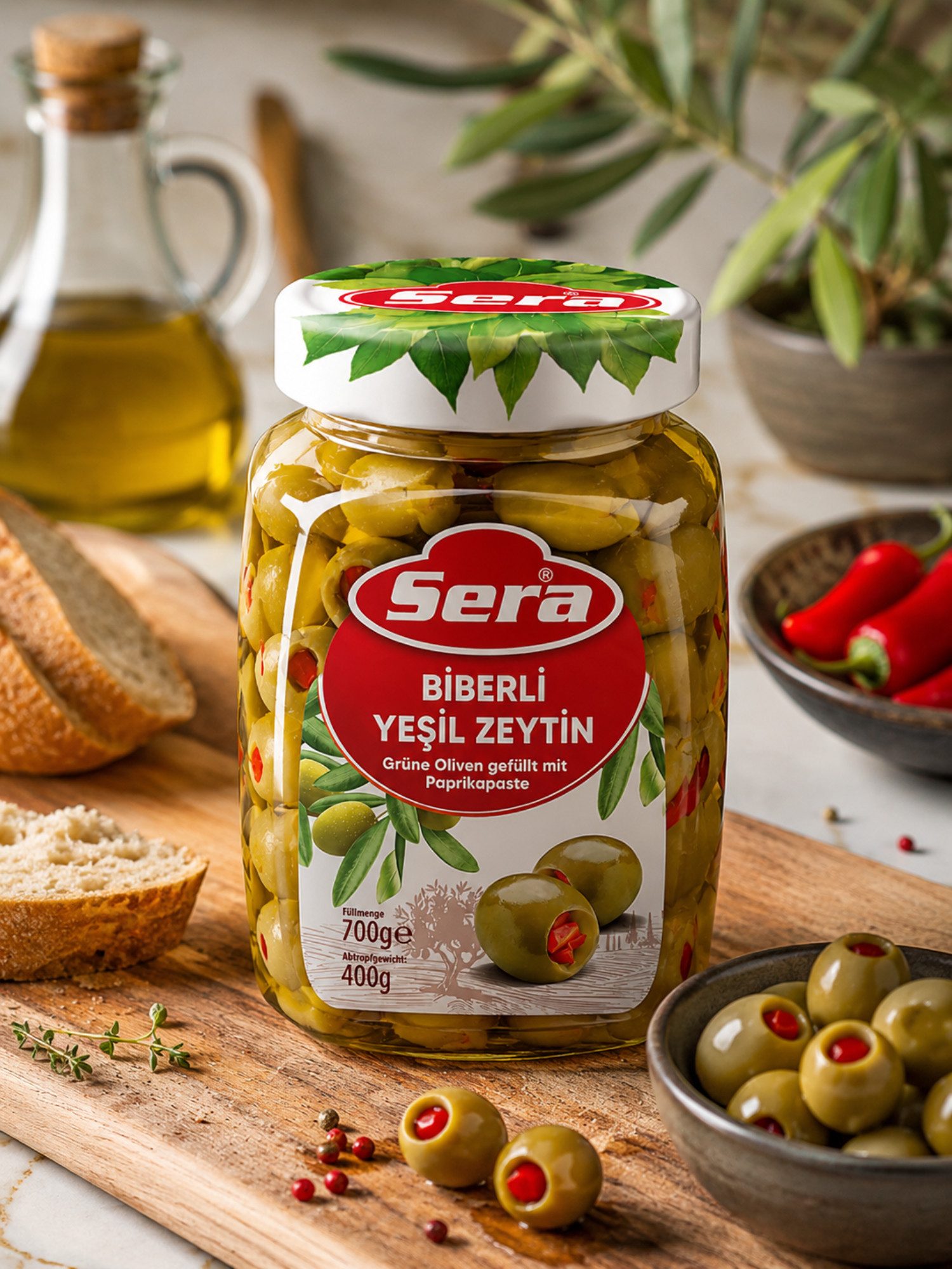 SERA FOOD Antipasti Sera Grüne Oliven mit Paprikapaste gefüllt 700g, 1 x 7000 g, Knackige Mediterrane Paprika-Oliven im Vorratsglas