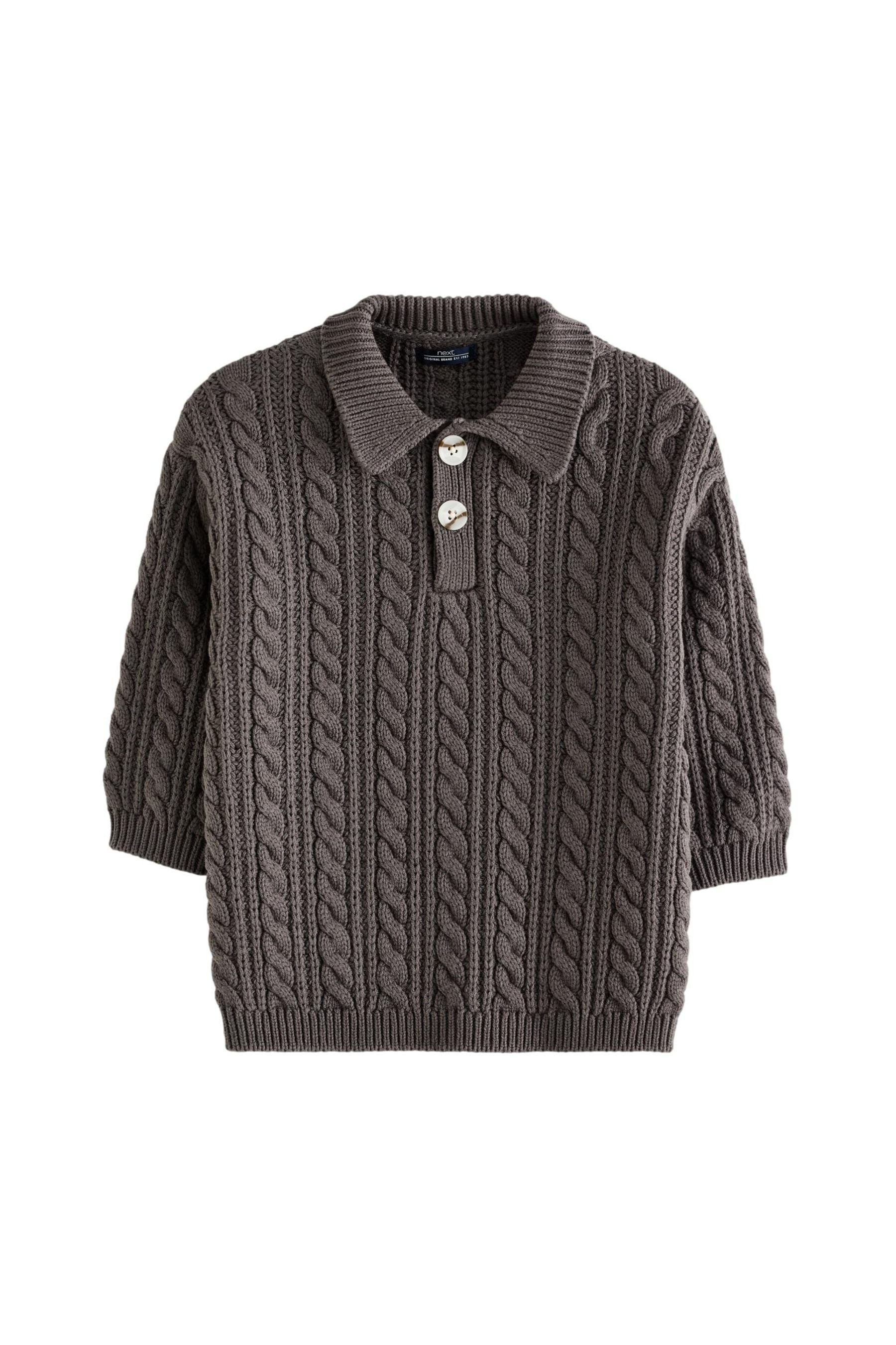 Klassischer Zopfstrickpullover mit Polokragen