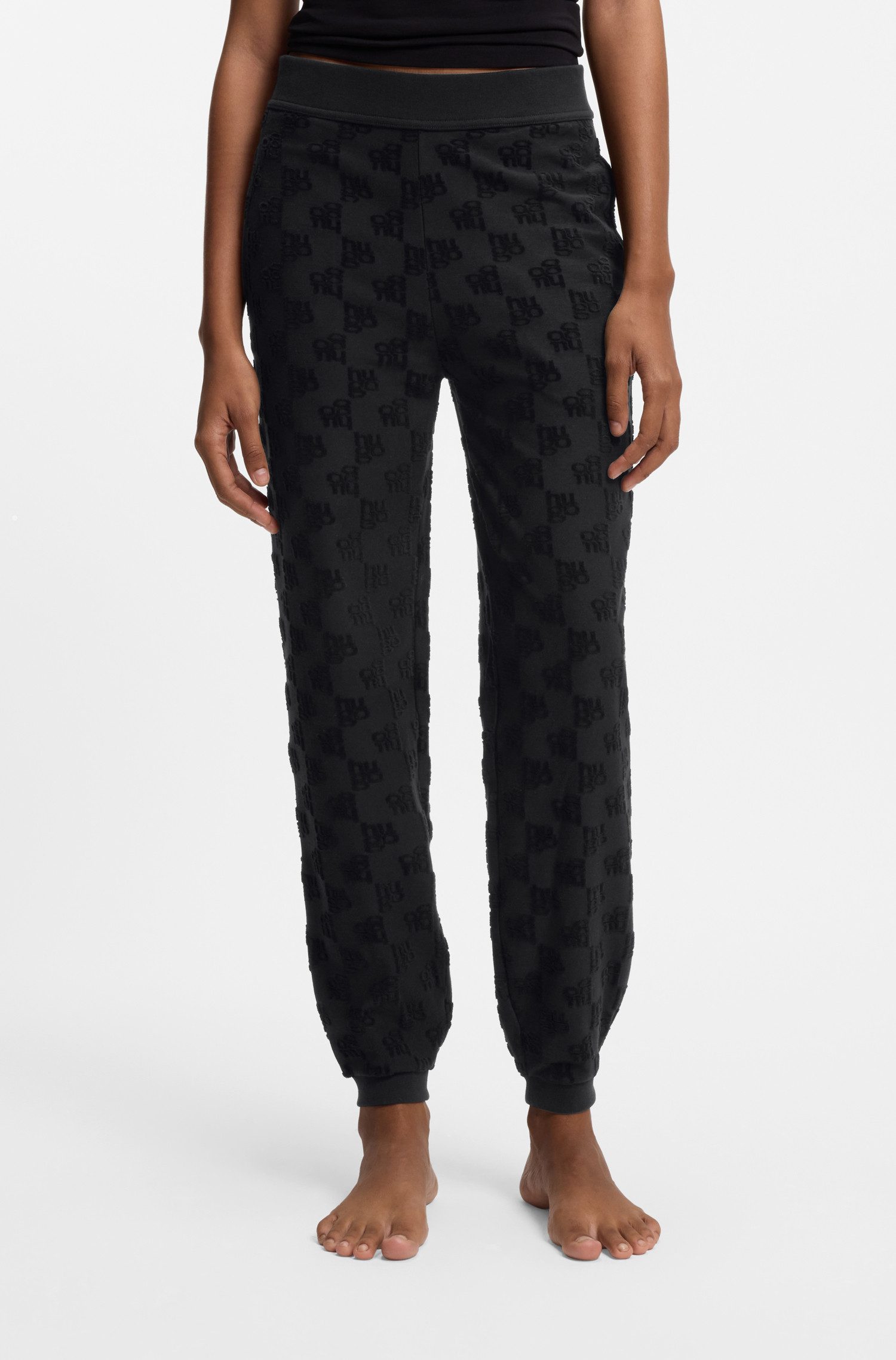 HUGO Jogginghose TERRYMONOGRAM aus Baumwoll-Mix mit Allover-Logo-Muster, el günstig online kaufen