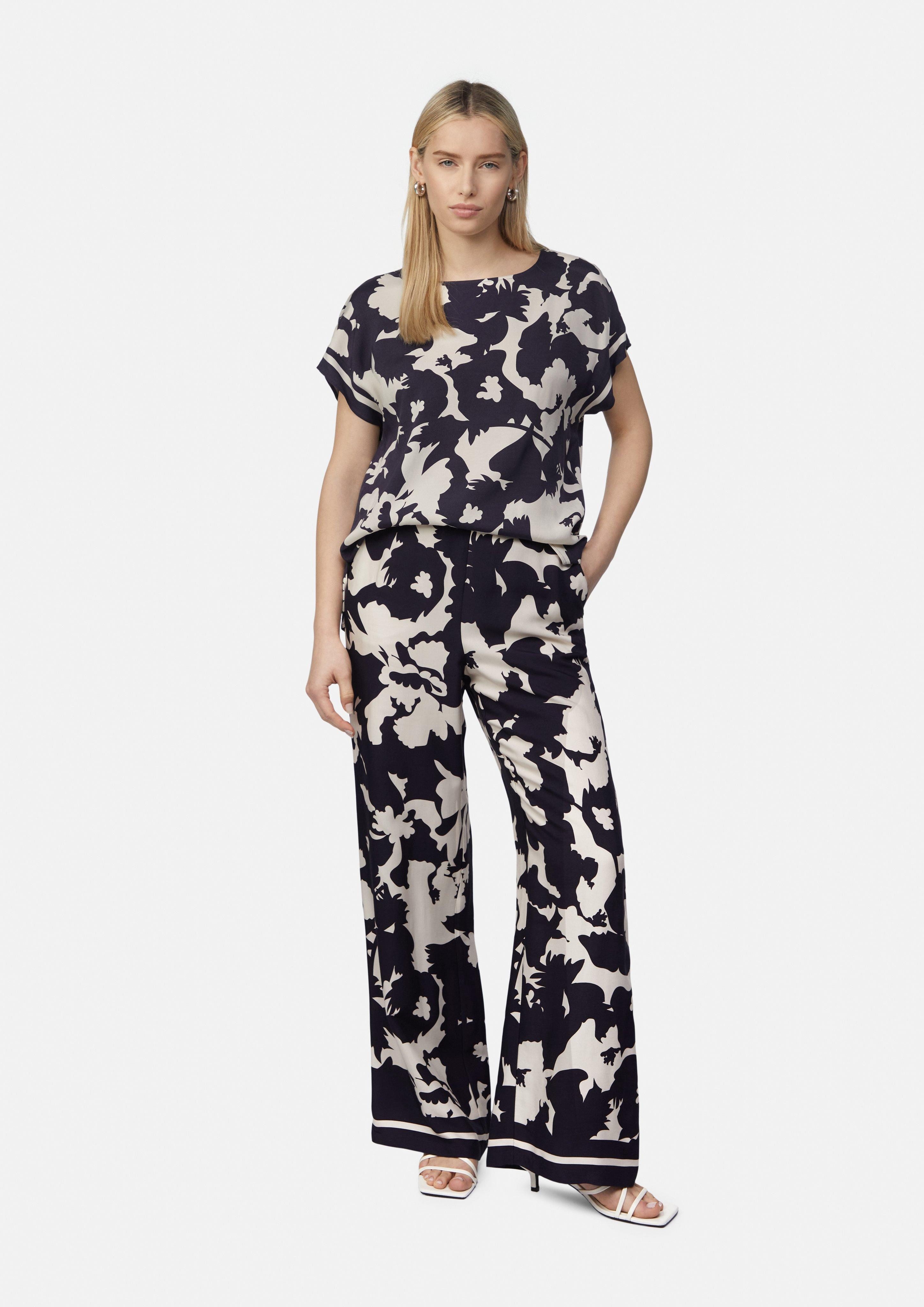 Stoffhose Feminine Schlupfhose mit weitem Bein und All-over-Print