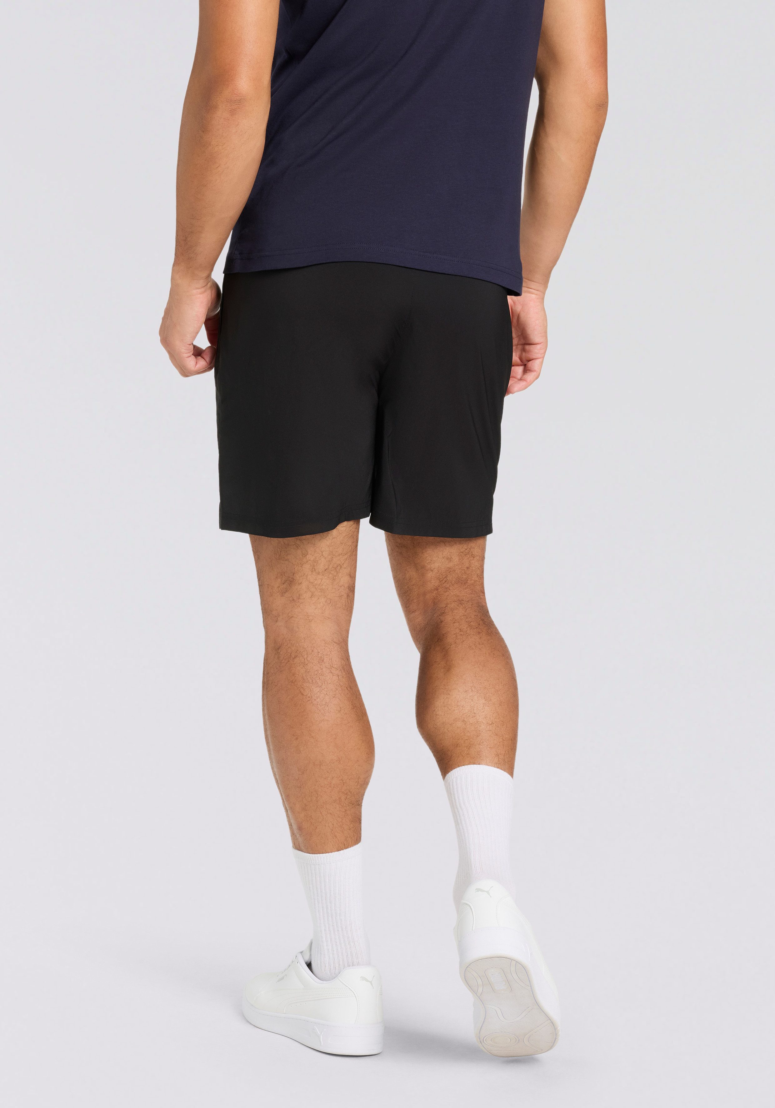 PUMA Trainingsshorts M TAD FOUNDATIONS 7" WOVEN SHORT W/ ZIP POCKETS günstig online kaufen