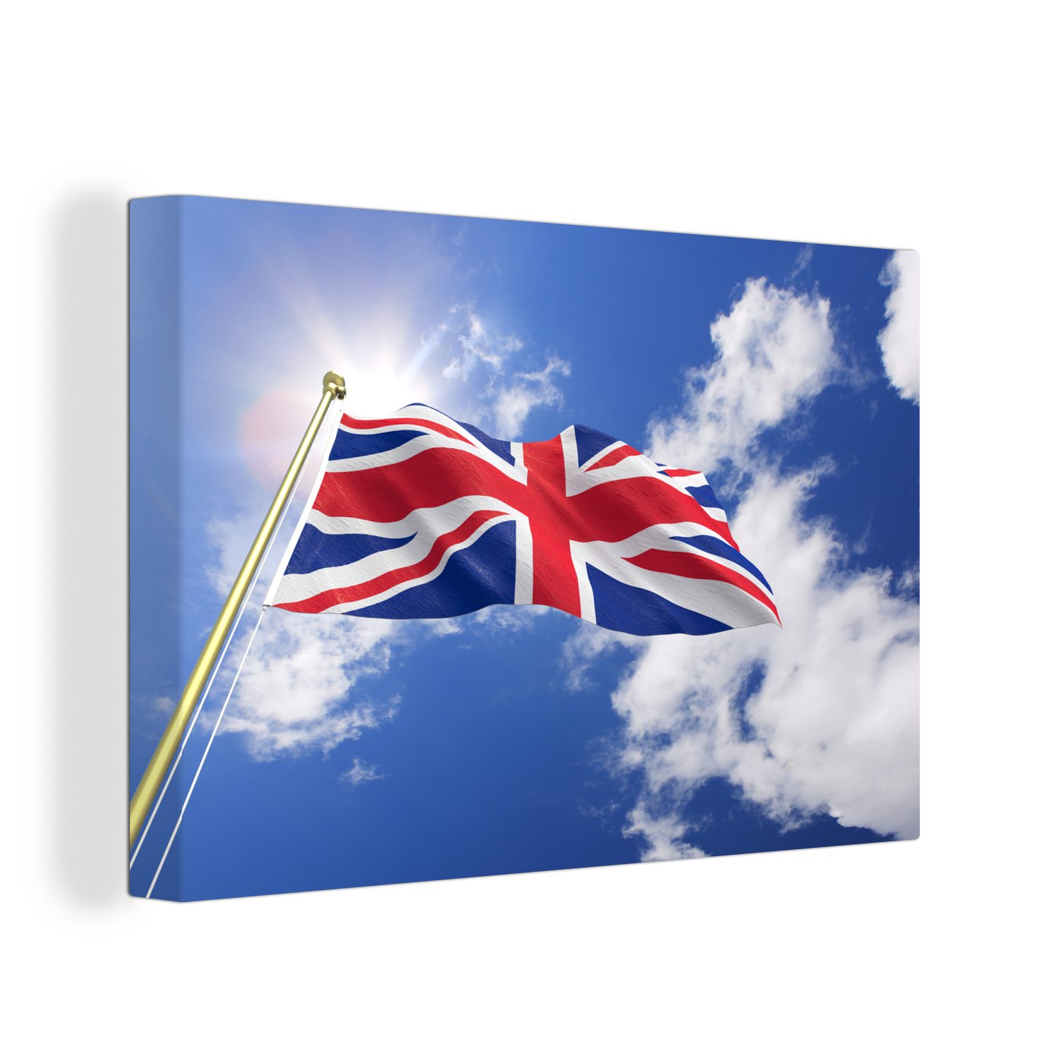 OneMillionCanvasses® Leinwandbild Die Flagge des Vereinigten Königreichs weht am Himmel, (1 St), Wandbild Leinwandbilder, Aufhängefertig, Wanddeko, 30x20 cm
