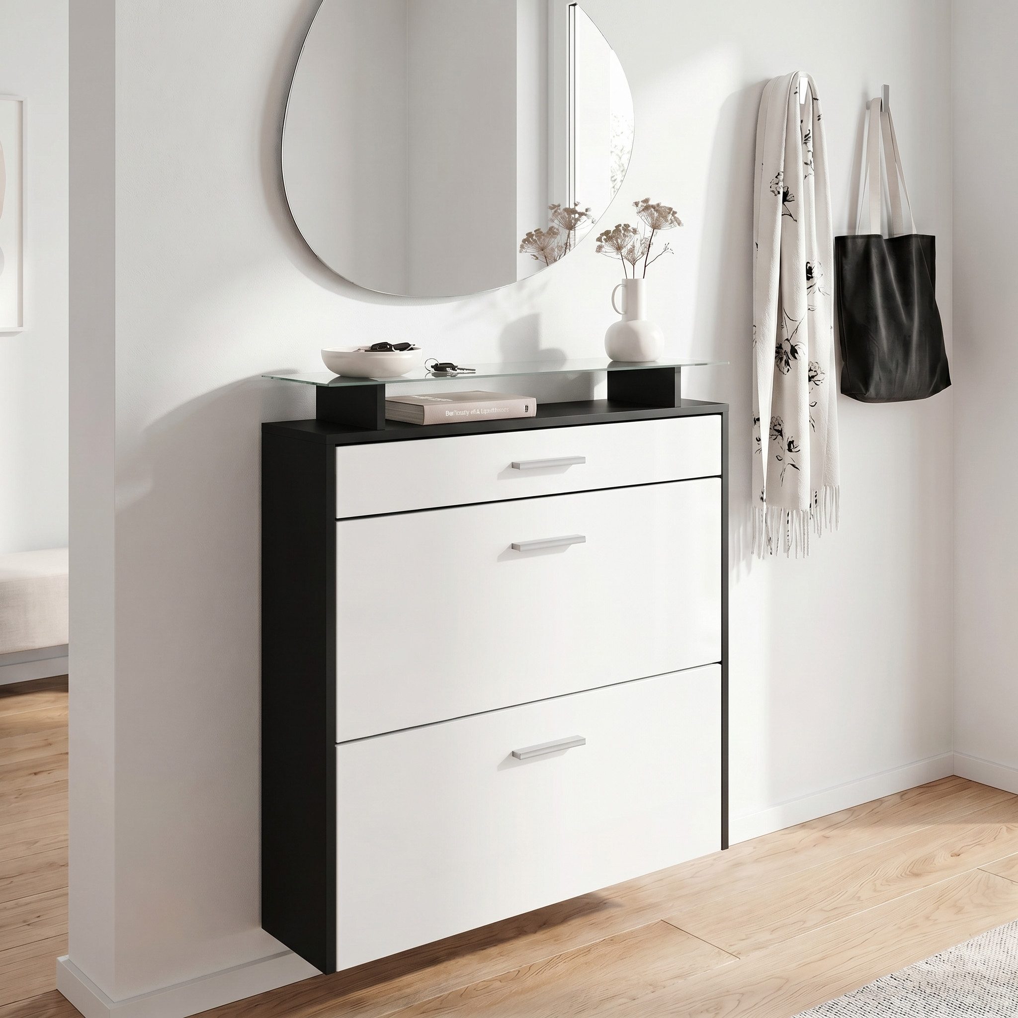 Vladon Schuhschrank Malea (hängender Schuhkipper für 16 Paar Schuhe, mit 2 Klappen und 1 Schublade und Glasablage) Schwarz matt/Weiß matt (89 x 96 x 23 cm)