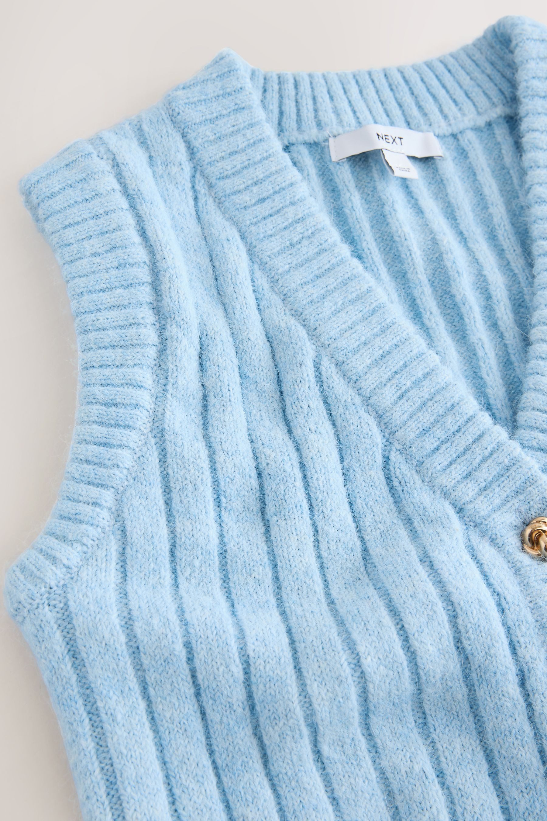 Next Strickjacke Rippstrick-Weste mit Knöpfen und Wollanteil (1-tlg) günstig online kaufen