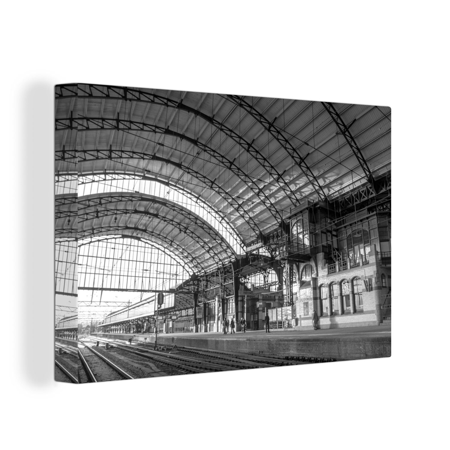 OneMillionCanvasses® Leinwandbild Der Bahnhof der niederländischen Stadt Haarlem - schwarz und weiß, (1 St), Wandbild Leinwandbilder, Aufhängefertig, Wanddeko, 30x20 cm