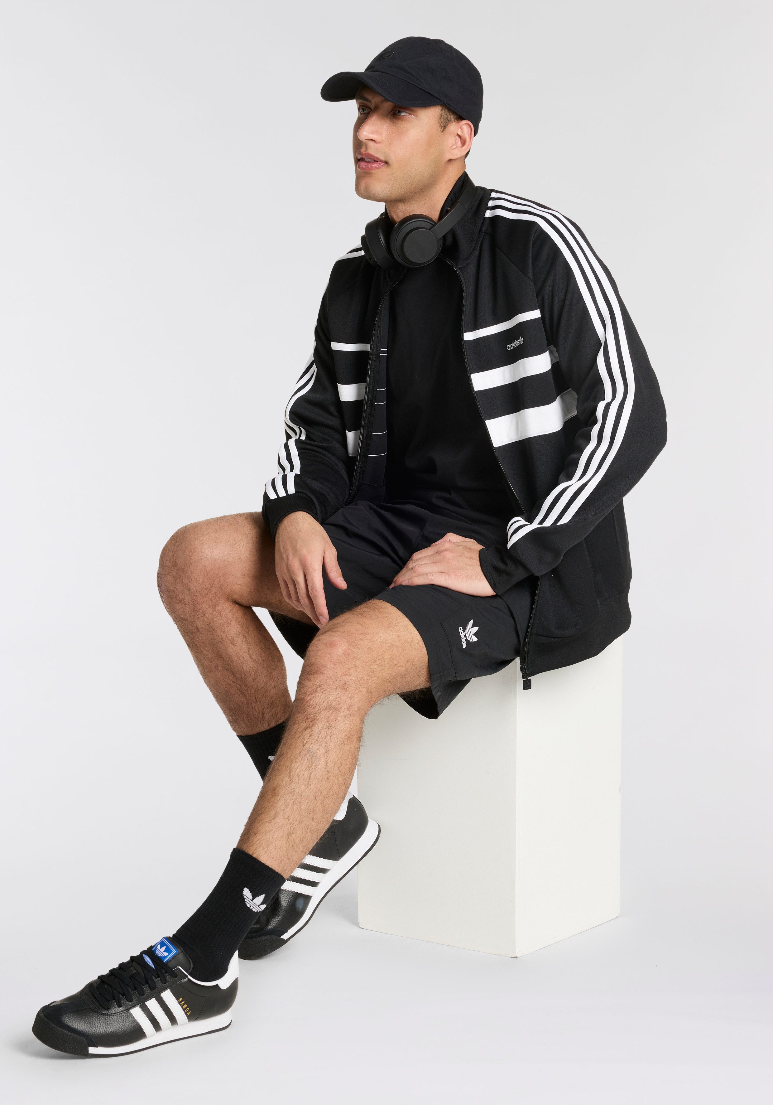 Zum Outfit 7