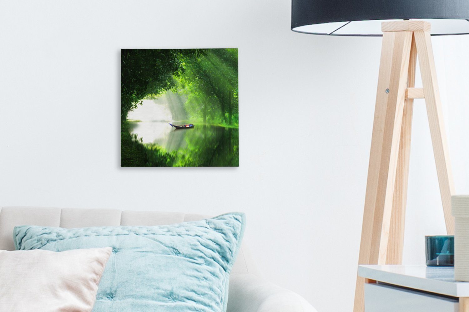 Leinwandbild Bilder umgeben Wohnzimmer Schlafzimmer Ein von St), OneMillionCanvasses® Wald, (1 Boot Leinwand einem grünem für auf Fluss,