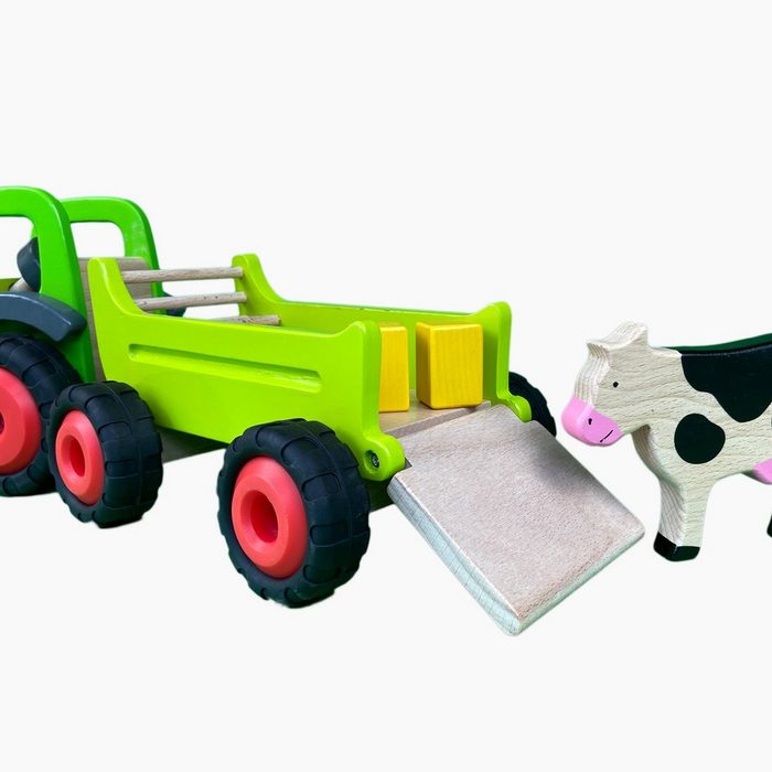 goki Spielzeug-Traktor Traktor mit Kuh Anhänger extrem robust verarbeitet Er ist zudem lenkbar