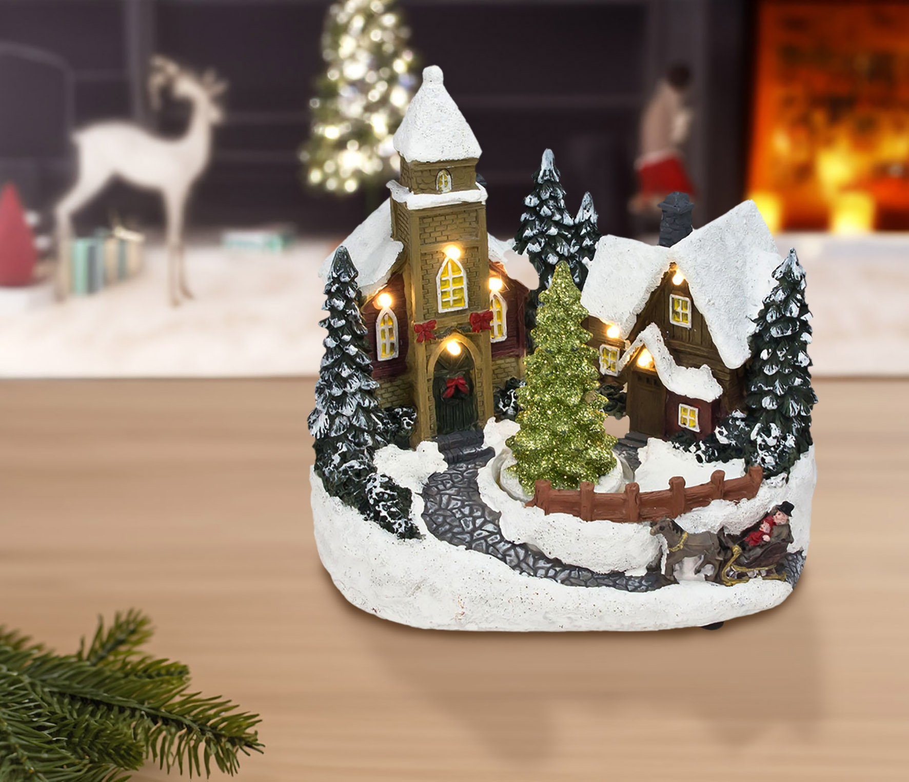 Spetebo Dekoobjekt LED Weihnachts Dorf Szene mit Bewegung - 19 cm, Deko Win günstig online kaufen