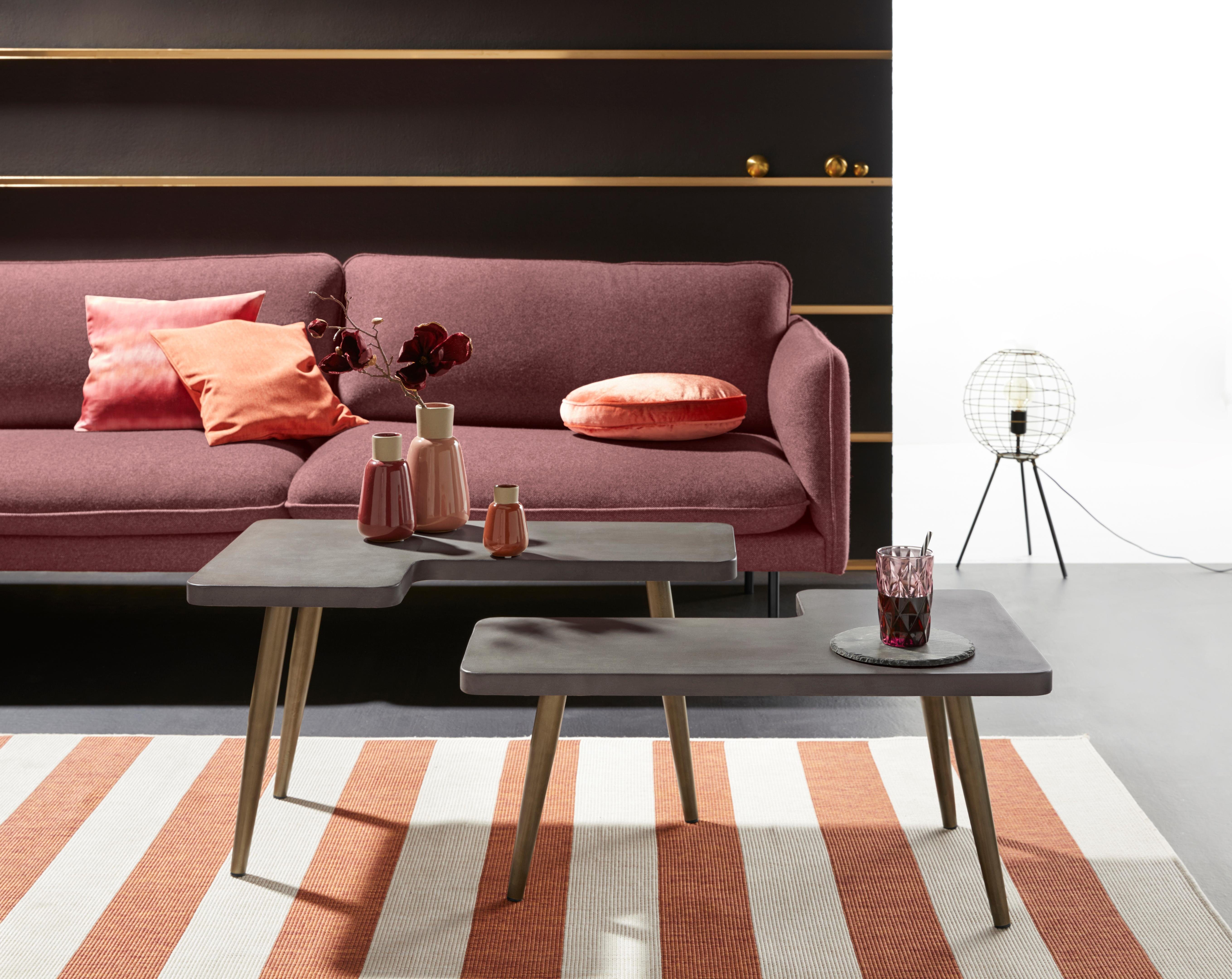 INOSIGN Couchtisch Loupe, Tischplatte aus Beton, Tischbeine aus Messing, Breite 137 cm