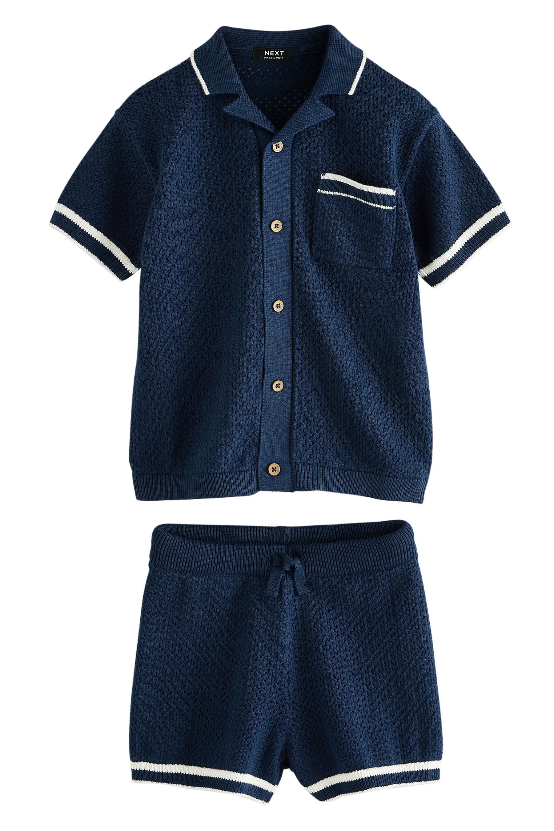 Shirt & Shorts Strukturiertes Strick-Poloshirt und Shorts