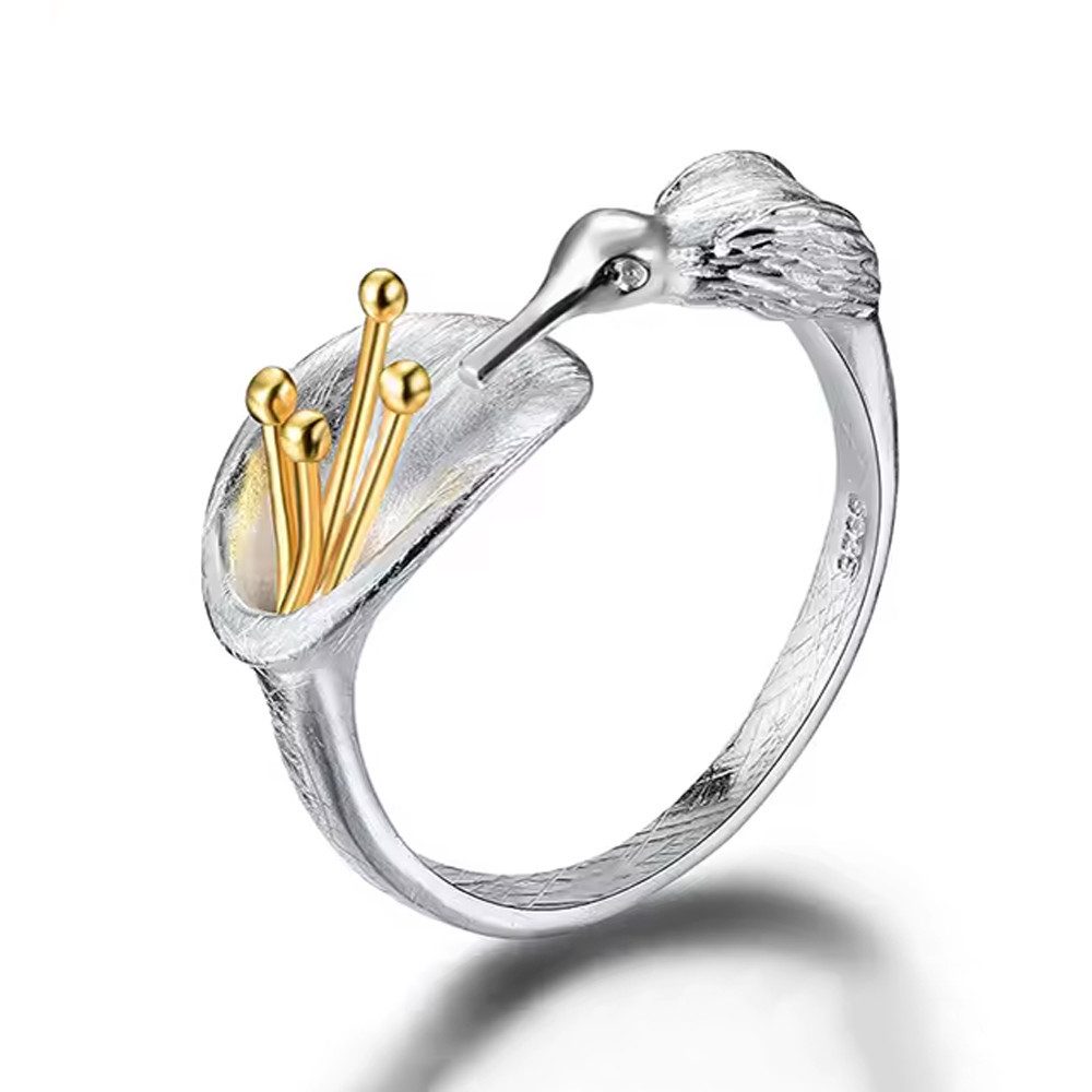 Silberring "Kolibri trinkt aus der Blume"