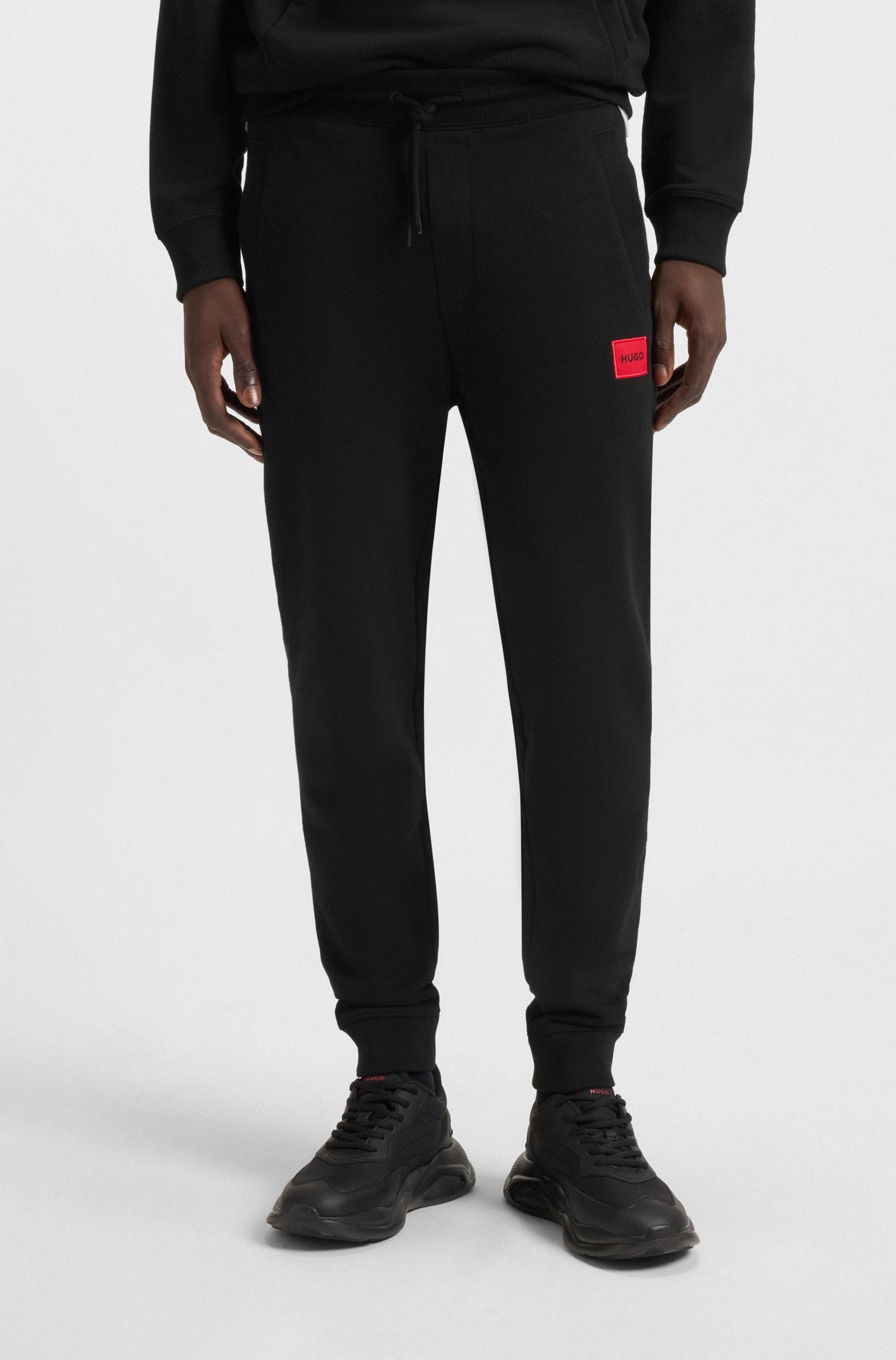 HUGO Sweathose Doak elastischer Bund, Regular Fit, Seitentaschen, Gesäßtasc günstig online kaufen