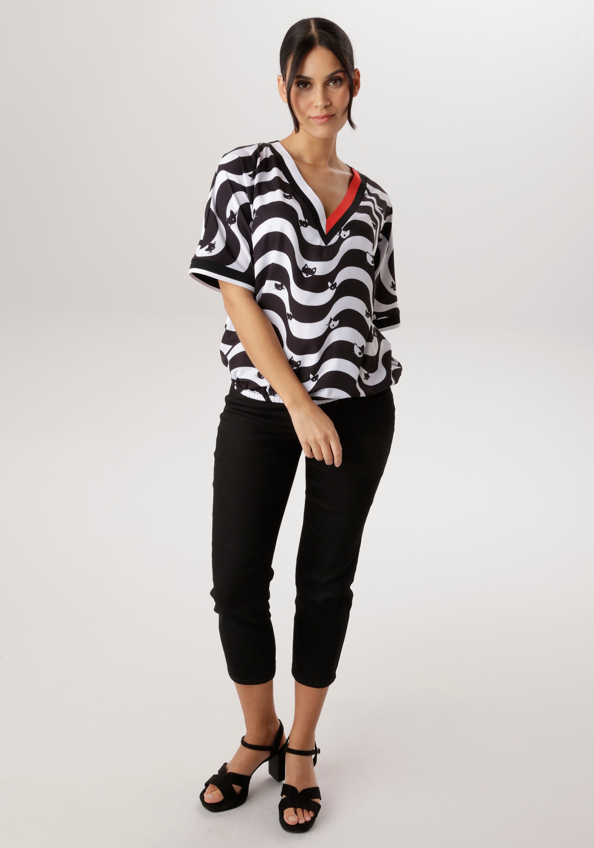 Zum Outfit 11