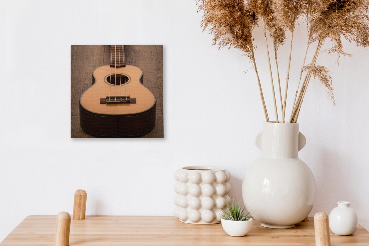 auf Wohnzimmer St), (1 Leinwandbild OneMillionCanvasses® Schlafzimmer Holztisch, Leinwand Akustische für Bilder einem Gitarre