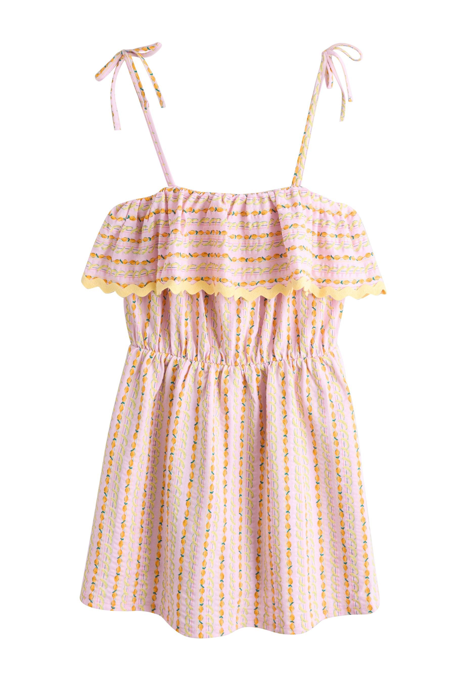 Next Playsuit Jersey-Playsuit mit gerüschtem Skort und Print (1-tlg)