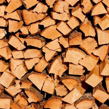 Wallario Möbelfolie Holzstapel gehackt - Holzscheite für den Kamin