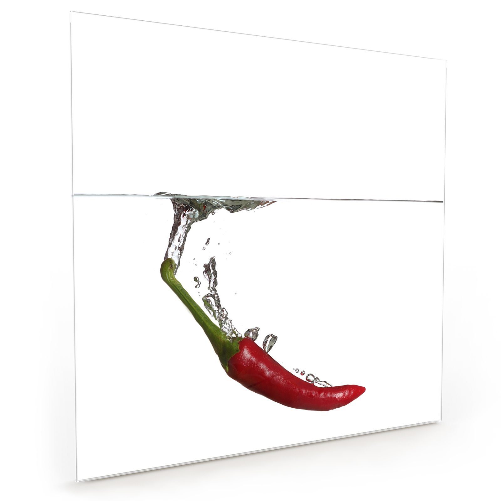 Primedeco Küchenrückwand Spritzschutz Glas Chili fällt ins Wasser