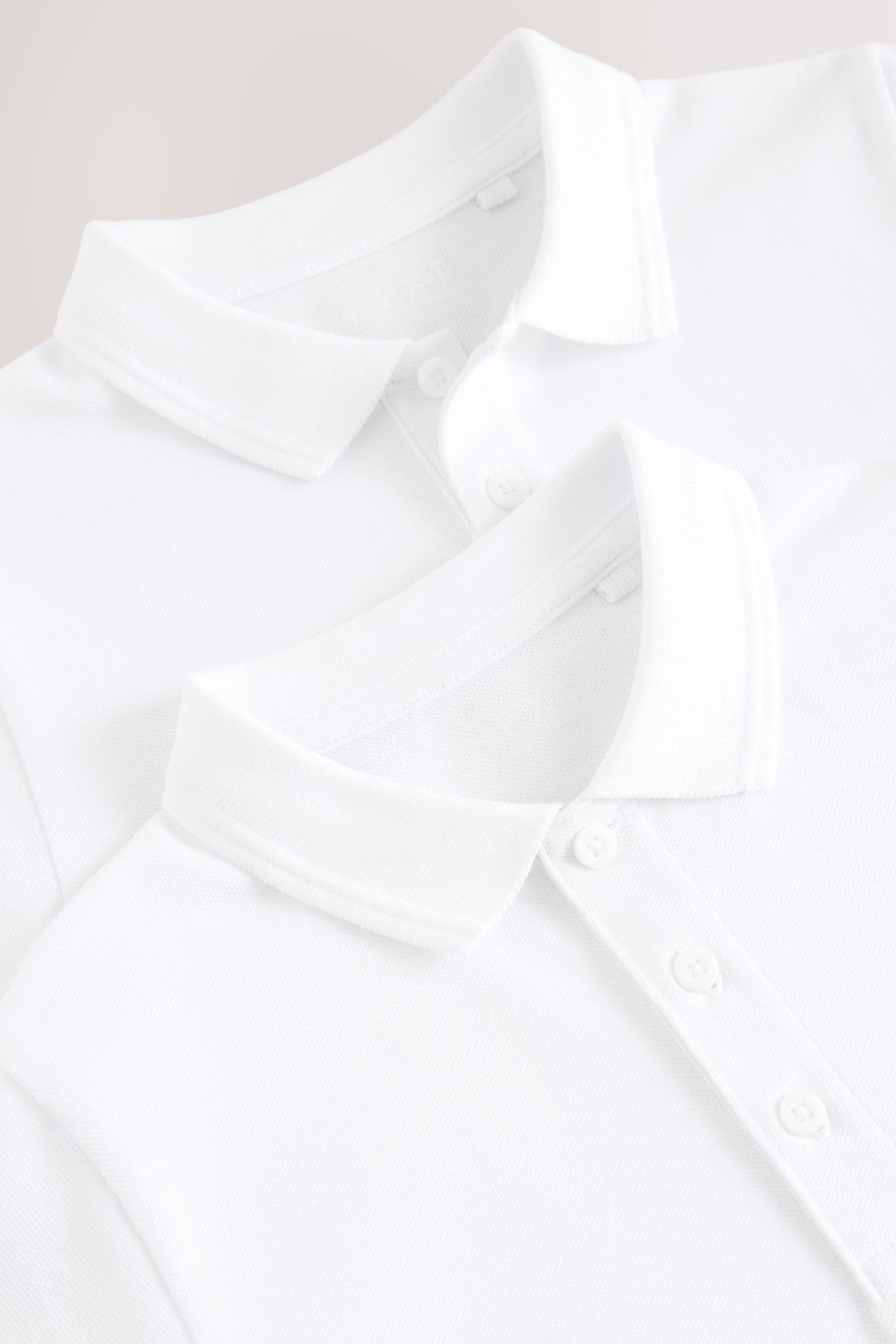 Next Poloshirt Kurzärmelige Slim Fit Poloshirts im 2er-Pack (2-tlg)