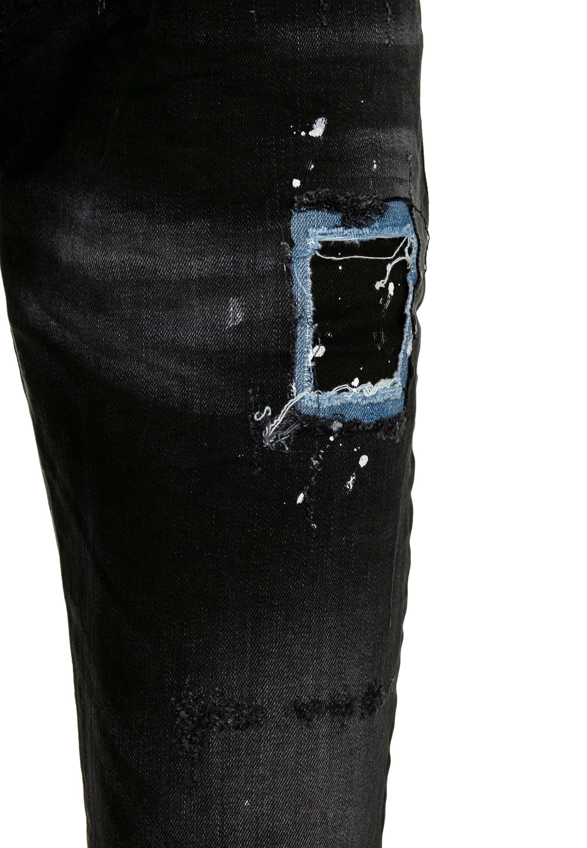Baxx & Bequeme Destroyed-Effekten Cipo mit Jeans
