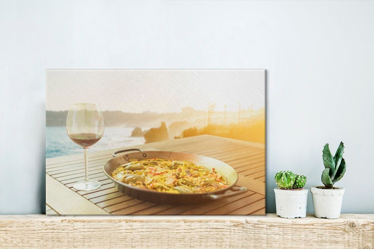 OneMillionCanvasses® Leinwandbild Paella, cm der traditionellsten St), bekanntesten und (1 Wandbild Wanddeko, spanischen, eines Aufhängefertig, 30x20 Leinwandbilder