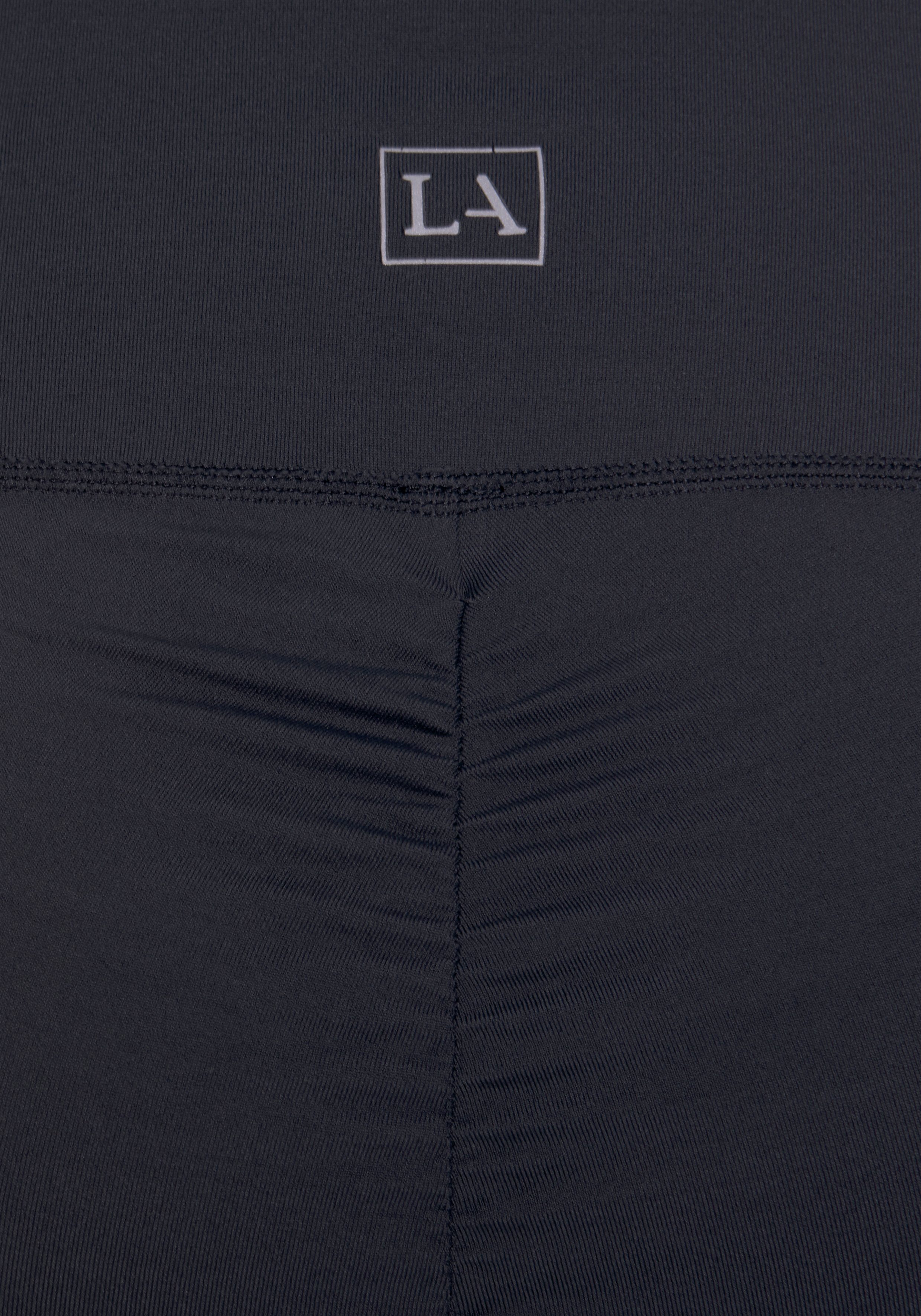 Raffung, -Sport Loungewear Funktionsleggings Leggings mit LASCANA schwarz ACTIVE kleiner