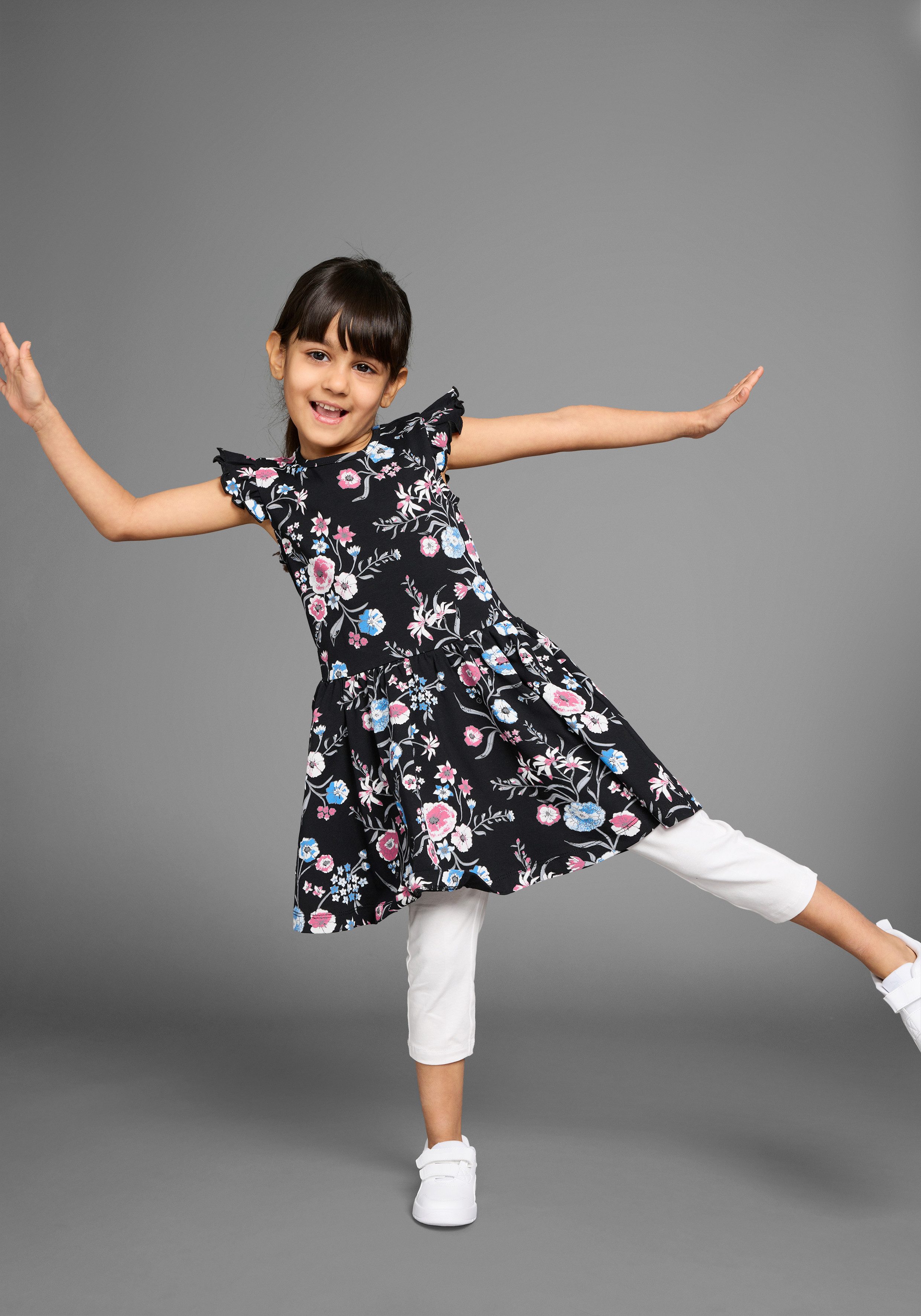 KIDSWORLD Jerseykleid Shirtkleid im trendigen Allover-Muster mit Flügelärmeln – Bild 4 von 5