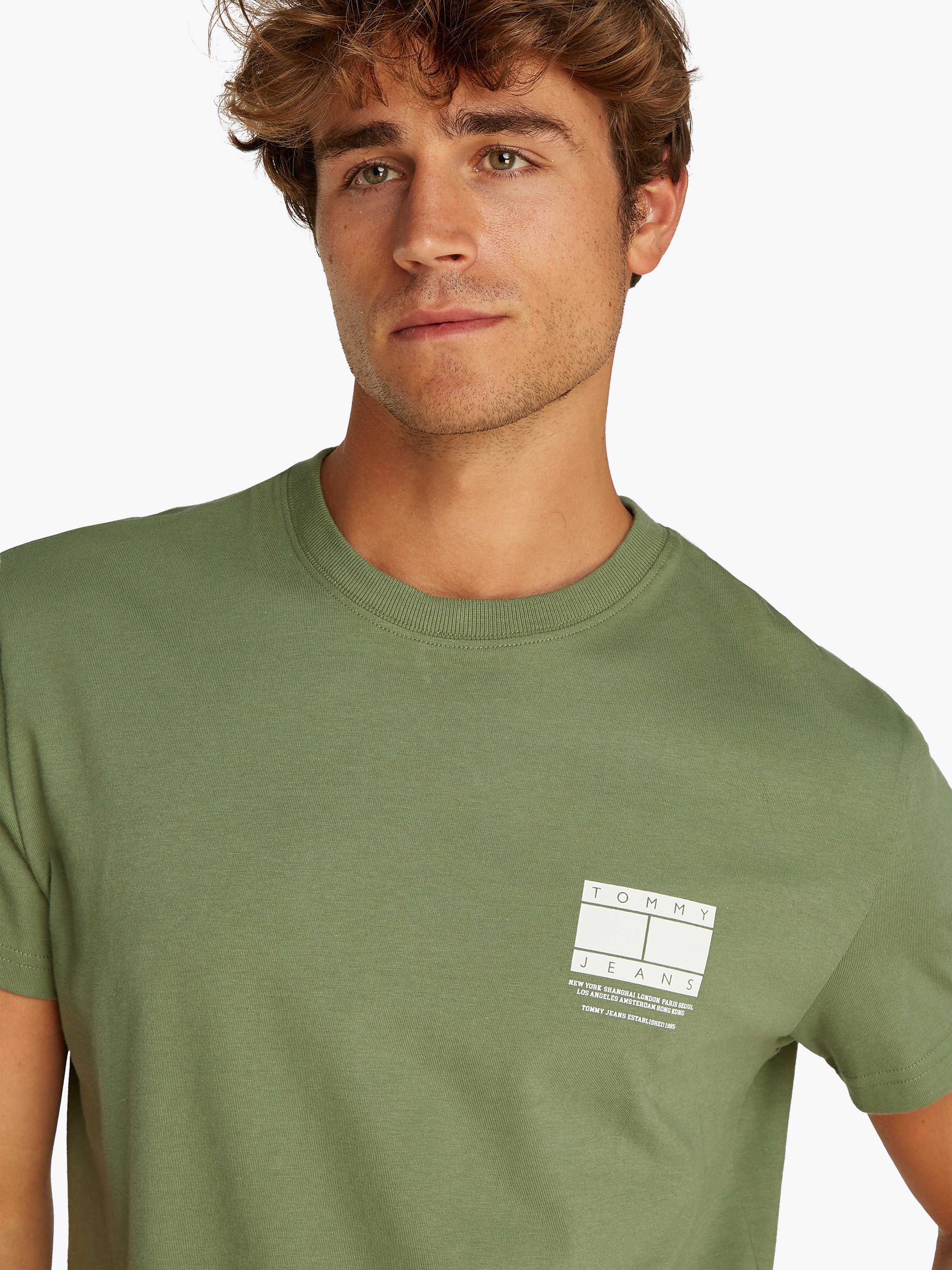 Tommy Jeans T-Shirt TJM REG DNA GRAPHIC TEE EXT mit kontrastfarbenen Print günstig online kaufen