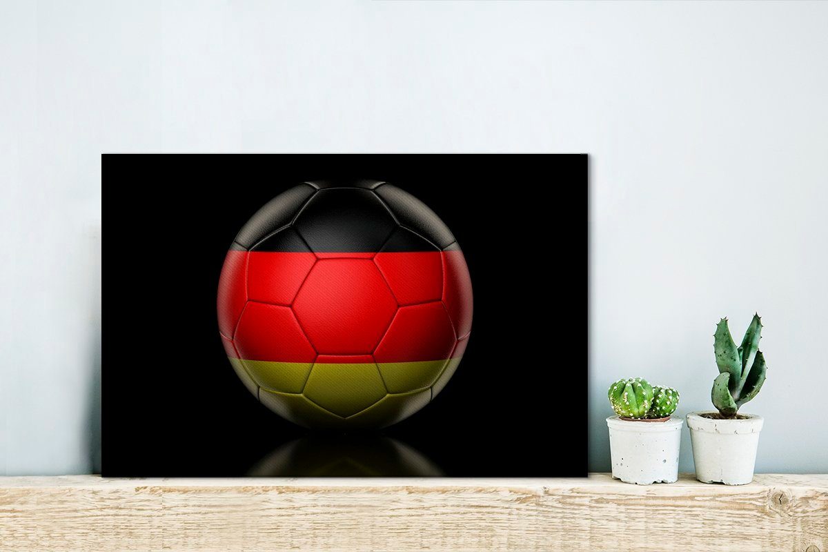 von Aufhängefertig, Flagge 30x20 auf Fußball, cm Wandbild Die (1 OneMillionCanvasses® einem Wanddeko, Leinwandbilder, Deutschland Leinwandbild St),