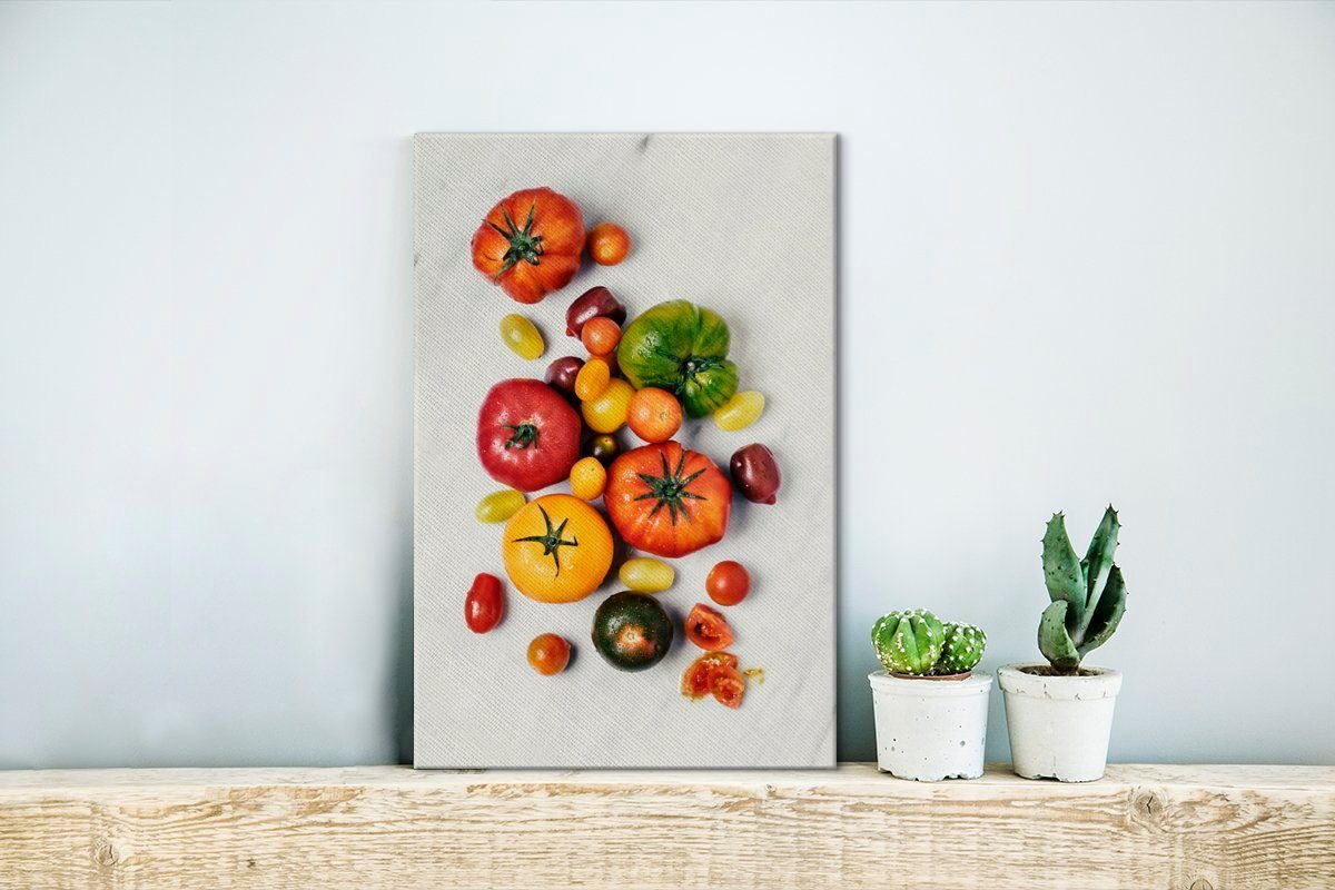 OneMillionCanvasses® Leinwandbild Verschiedene Marmoroberfläche, inkl. Tomaten cm auf weißen Gemälde, bespannt Leinwandbild St), fertig einer (1 Zackenaufhänger, 20x30