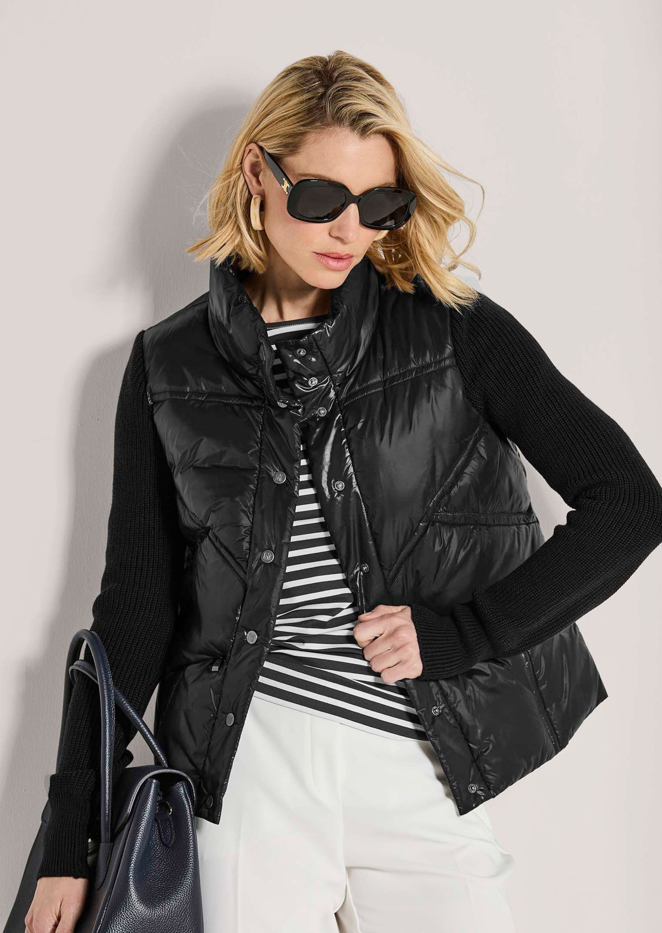 MADELEINE Outdoorjacke Sportive Übergangsjacke mit Strickärmeln Leicht wattierte Jacke mit Stehkragen, Kapuze und langen Ärmeln