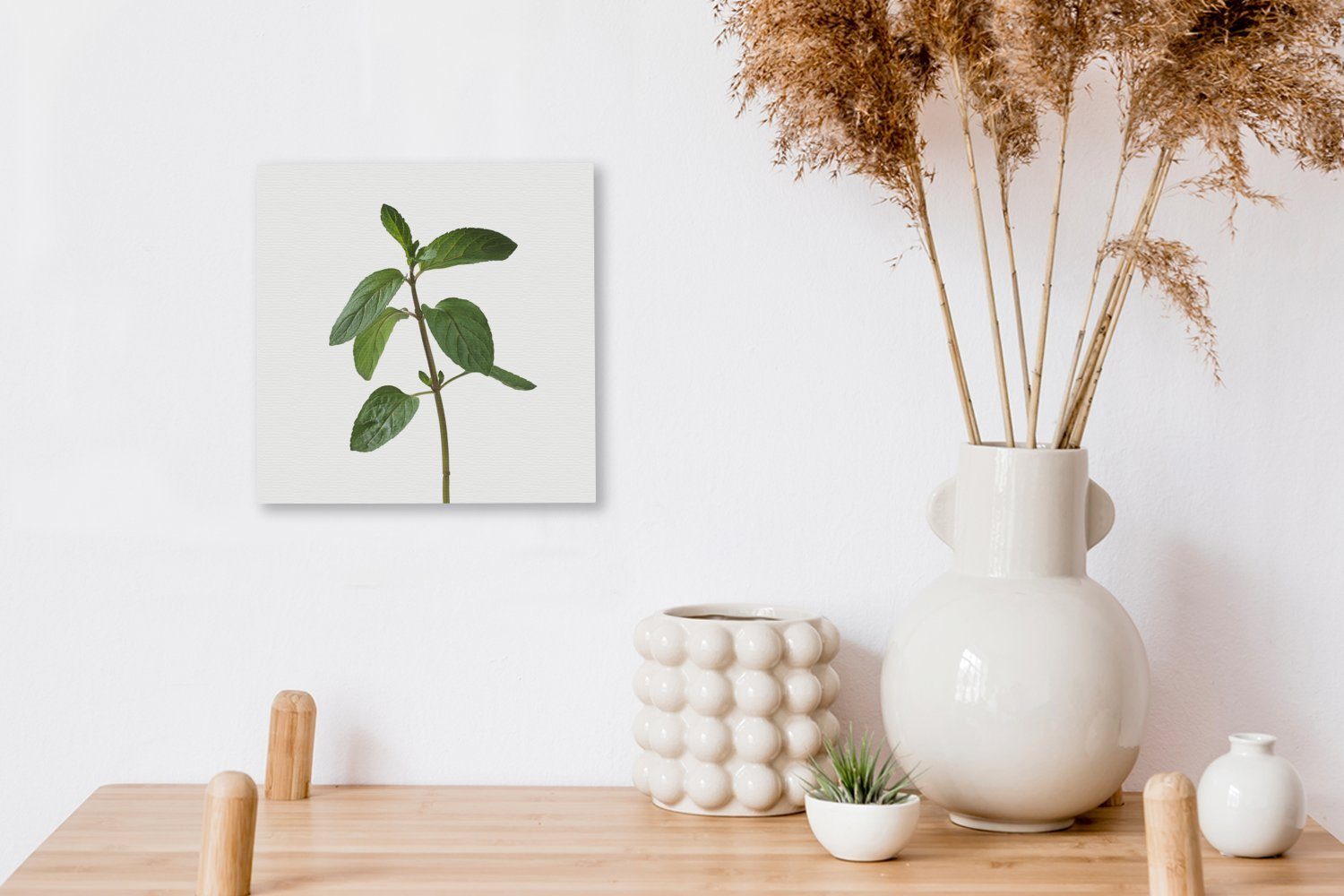 OneMillionCanvasses® Leinwandbild Ein einsamer für Zweig St), einer Bilder Leinwand Schlafzimmer Minzpflanze, (1 Wohnzimmer