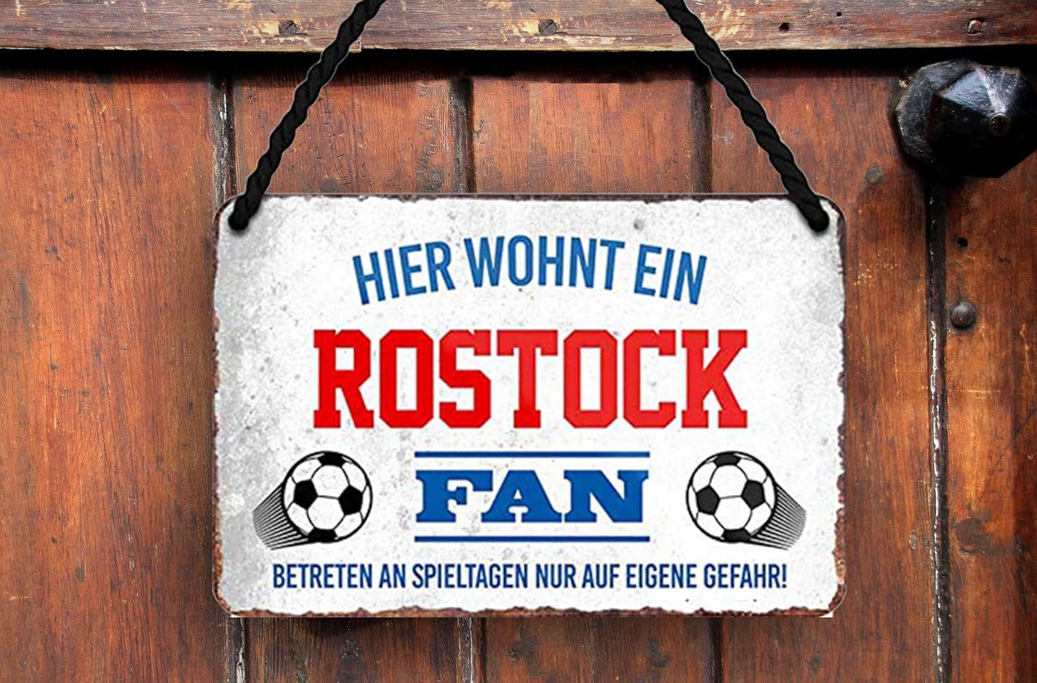 schilderkreis24 Metallschild Blechschild Hier wohnt ein Rostock Fan 18x12cm